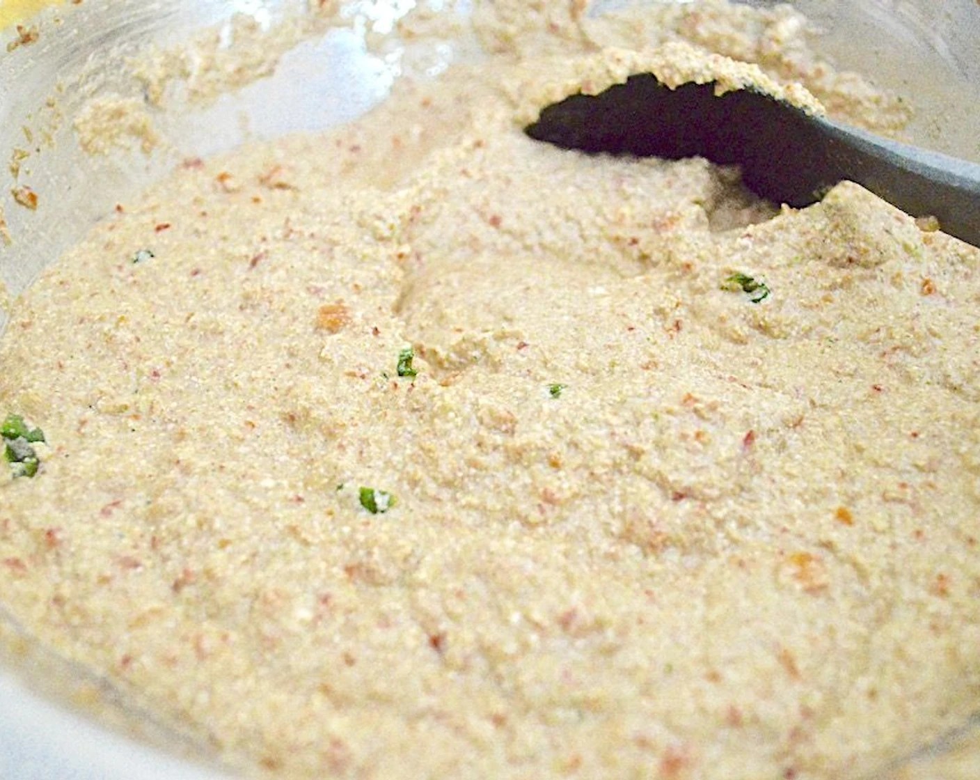 step 7 Keep whisking it occasionally so that it doesn't become lumpy. While the bechamel cooks, finish the filling by stirring the Whole Milk Ricotta Cheese (3 2/3 cups), Fresh Basil (4 Tbsp), Grated Parmesan Cheese (4 Tbsp), Salt (2 pinches), and Ground Black Pepper (2 pinches) into the bowl with the veggies thoroughly.