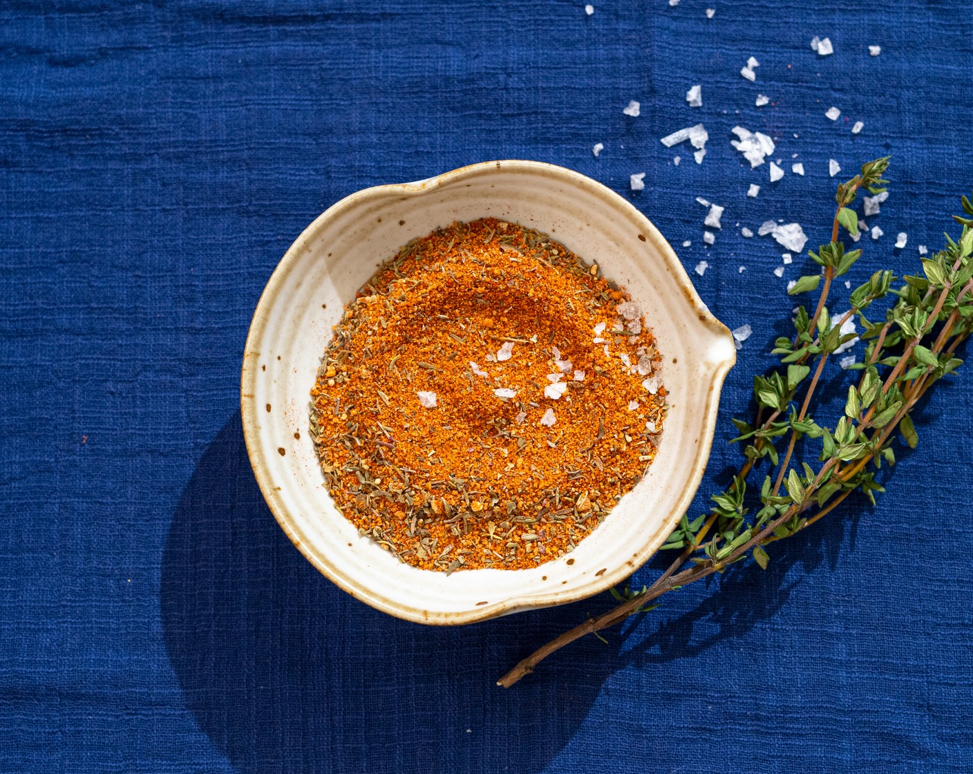 step 1 In a small mixing bowl, add the Dark Brown Sugar (3 Tbsp), Smoked Paprika (3 Tbsp), Coarse Salt (3 Tbsp), Simply Organic Garlic Powder (2 Tbsp), Simply Organic Onion Powder (2 Tbsp), Ground Black Pepper (1 Tbsp), Baking Powder (1/2 cup), Dried Basil (1/3 cup), Dried Thyme (1/3 cup), and Cayenne Pepper (1/3 cup) together and mix well. Store in an air-tight container for up to 6 months in a cool, dry place.