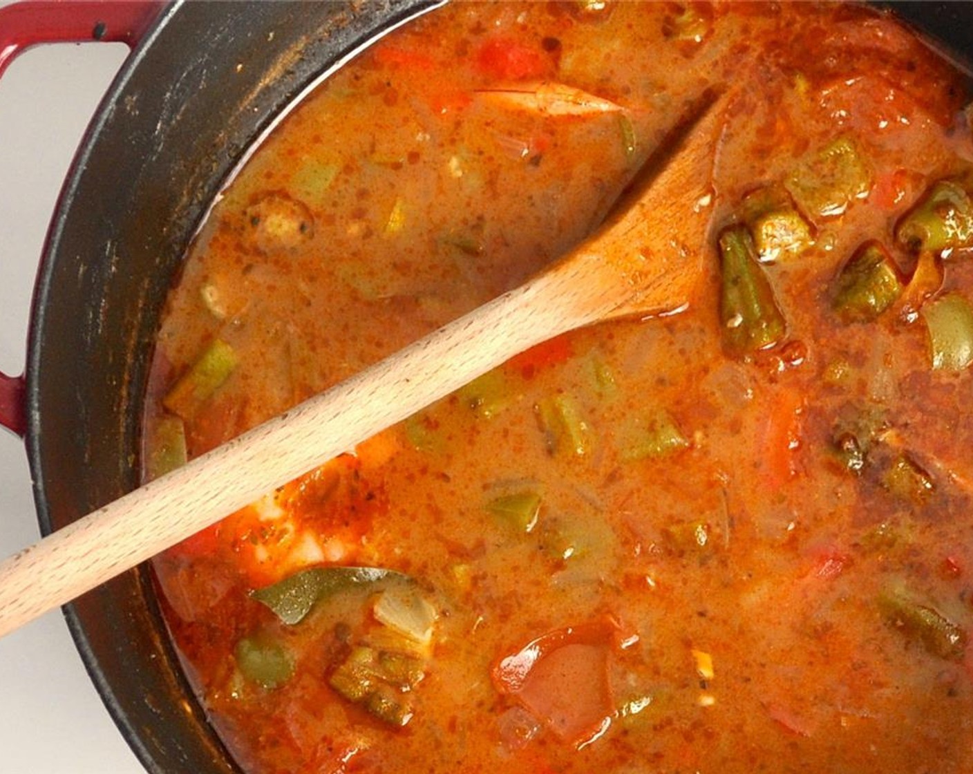 step 7 Add Bay Leaves (2) and Chicken Stock (5 cups). Bring to a simmer and simmer for about 30 minutes.