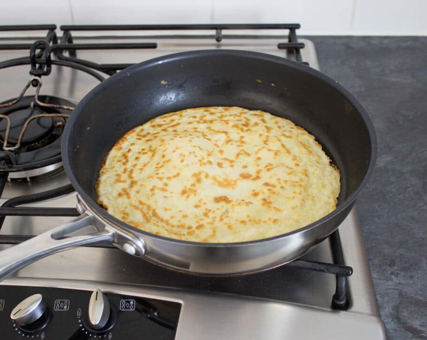 step 8 Don’t be tempted to keep moving it about either – that’s how they tear. Once it’s ready, carefully flip the crepe and cook the other side for a minute or two until equally golden brown in colour.