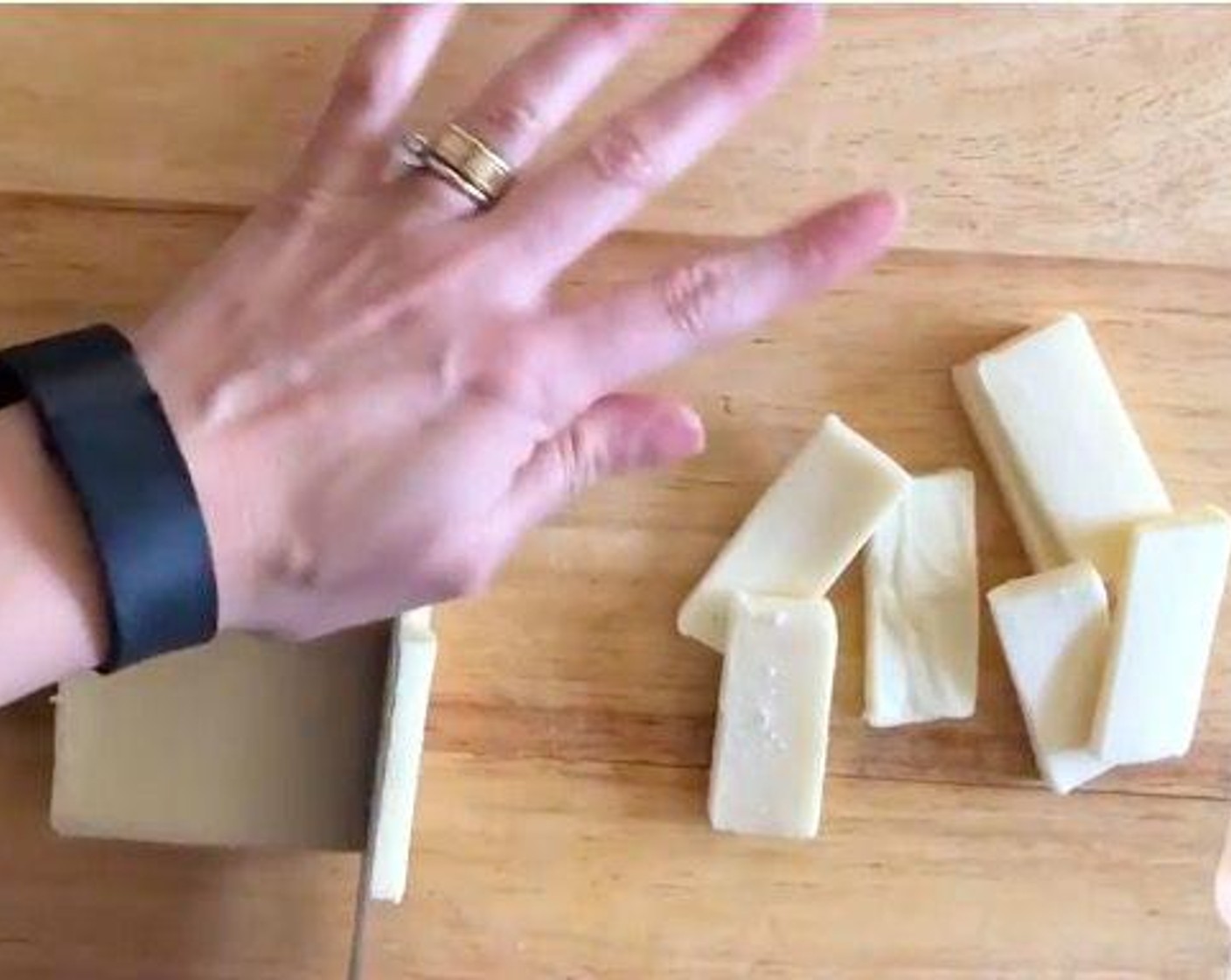 step 2 Cut Cream Cheese (225 g) in half lengthwise. Cut into 1/4-inch slices.