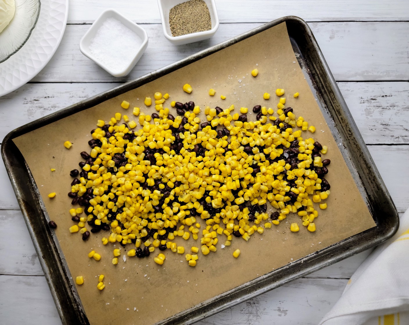 step 5 Spread out the Canned Corn (2 2/3 cups) and Black Beans (1 can) over the sheet pan.