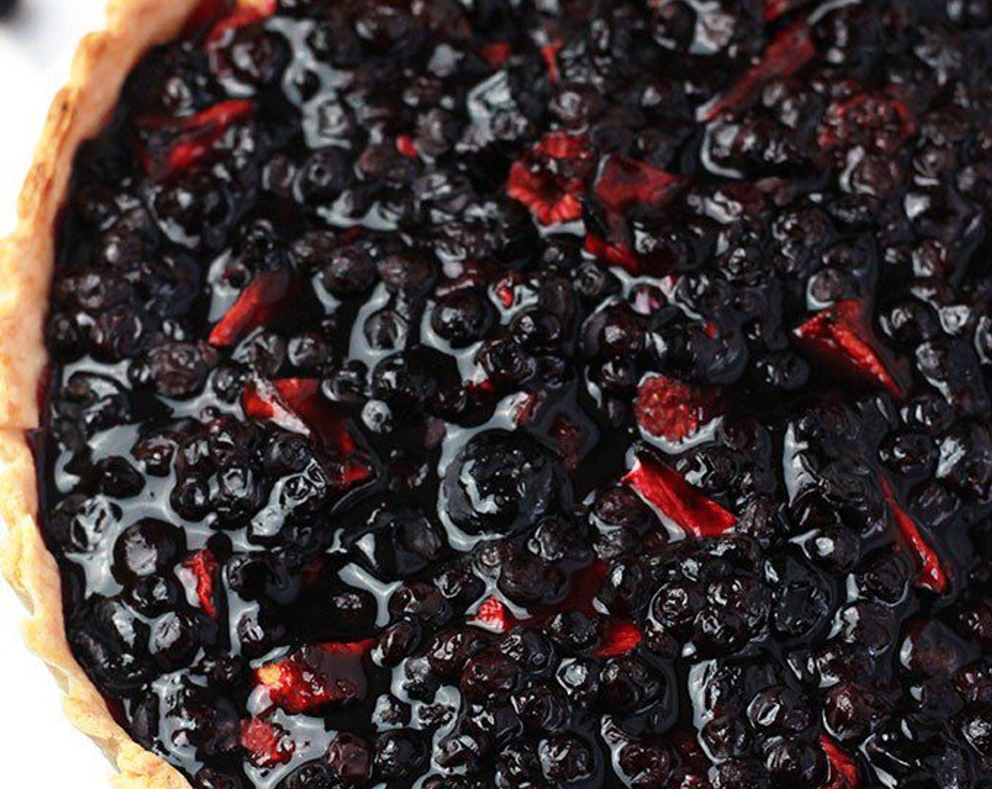 step 11 Allow tart to cool slightly before spreading the top with Wild Blueberry Sauce. When ready, simply slice and serve as is or serve with frozen yogurt, ice cream or a dollop of whipped topping. Enjoy!