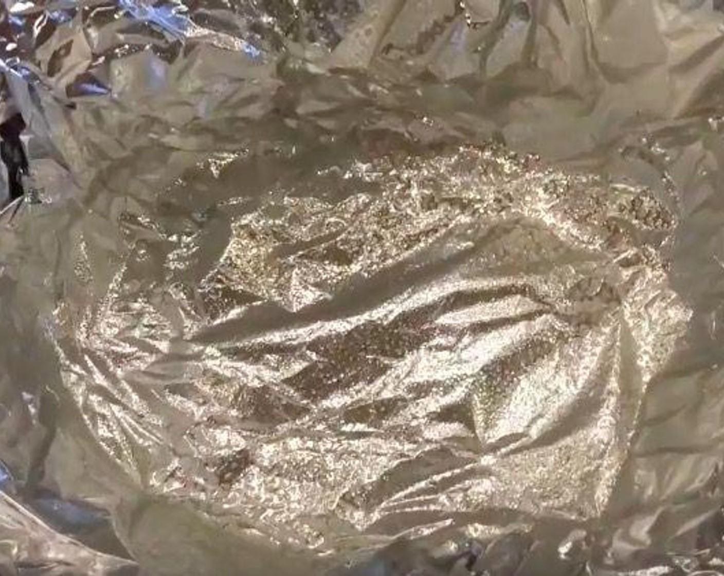 step 1 Line your crock pot with aluminum foil leaving enough to cover the potatoes completely. Spray aluminum foil with Nonstick Cooking Spray (as needed).
