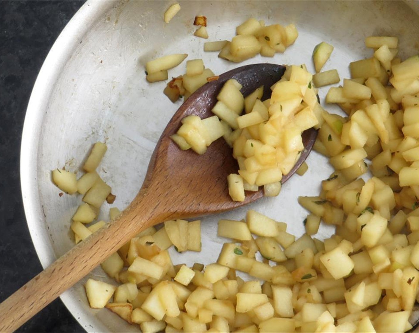 step 7 Add sage and thyme to pan and cook until crispy, 1-2 minutes. Reserve fat in the pan and transfer herbs to the same paper towel as the pancetta. Add the diced apple to the pan and cook over medium high heat until softened, 2-3 minutes.