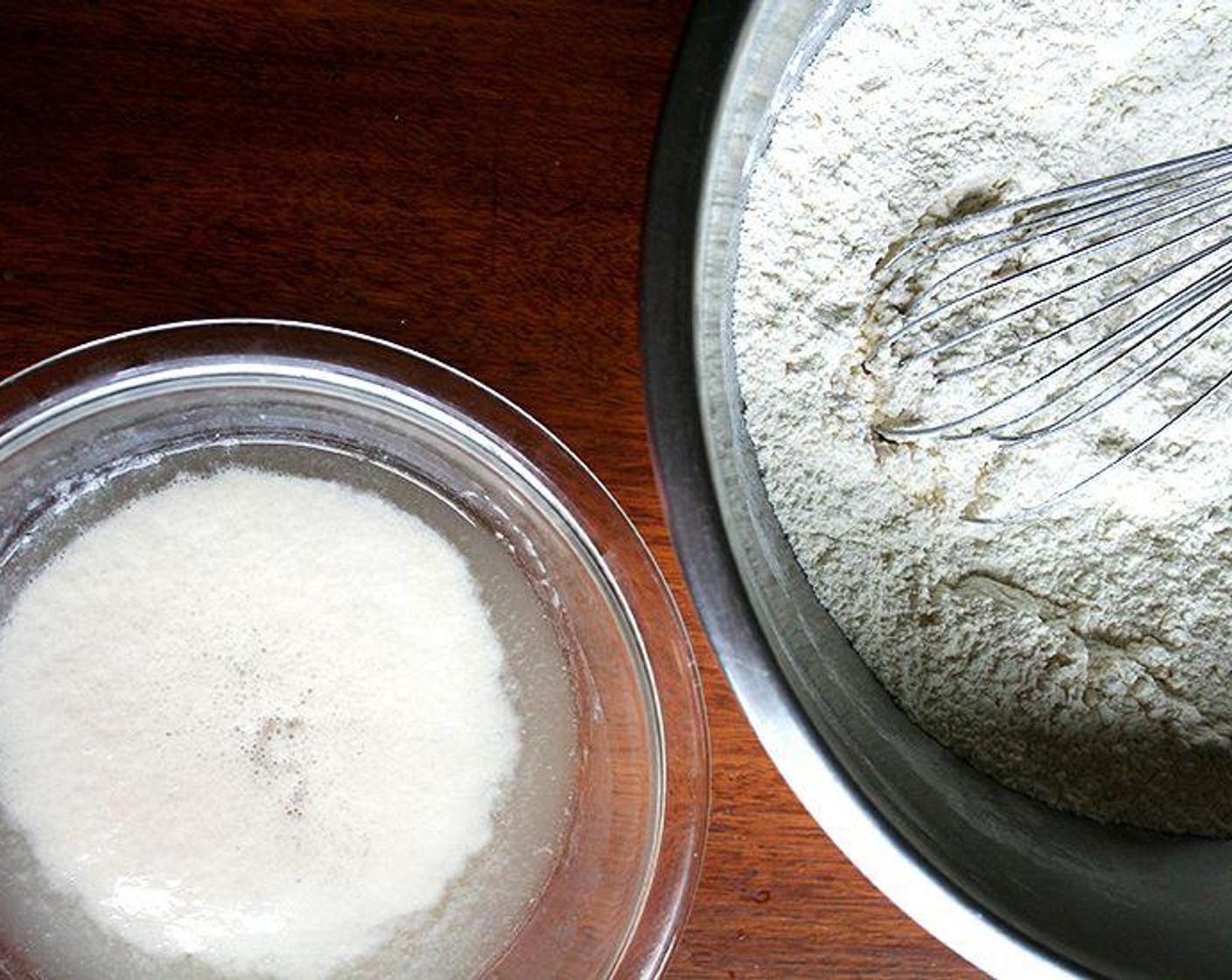 step 1 In a large mixing bowl, whisk together the Unbleached All Purpose Flour (4 cups), Kosher Salt (1/2 Tbsp), Granulated Sugar (1/2 Tbsp), and Instant Dry Yeast (1/2 Tbsp).