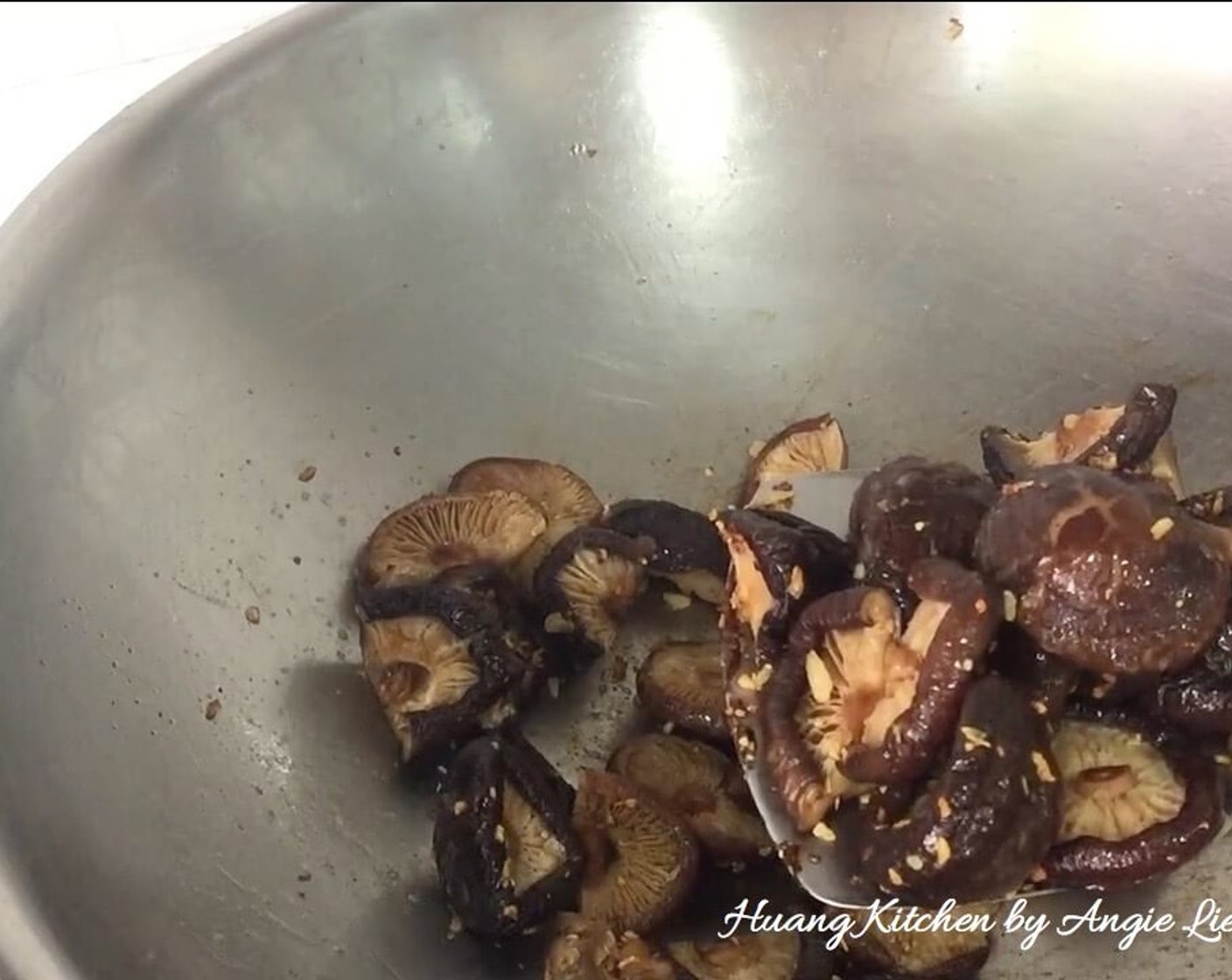 step 10 Drain well and saute the mushrooms till aromatic and brown slightly. Remove from wok and place in a bowl.