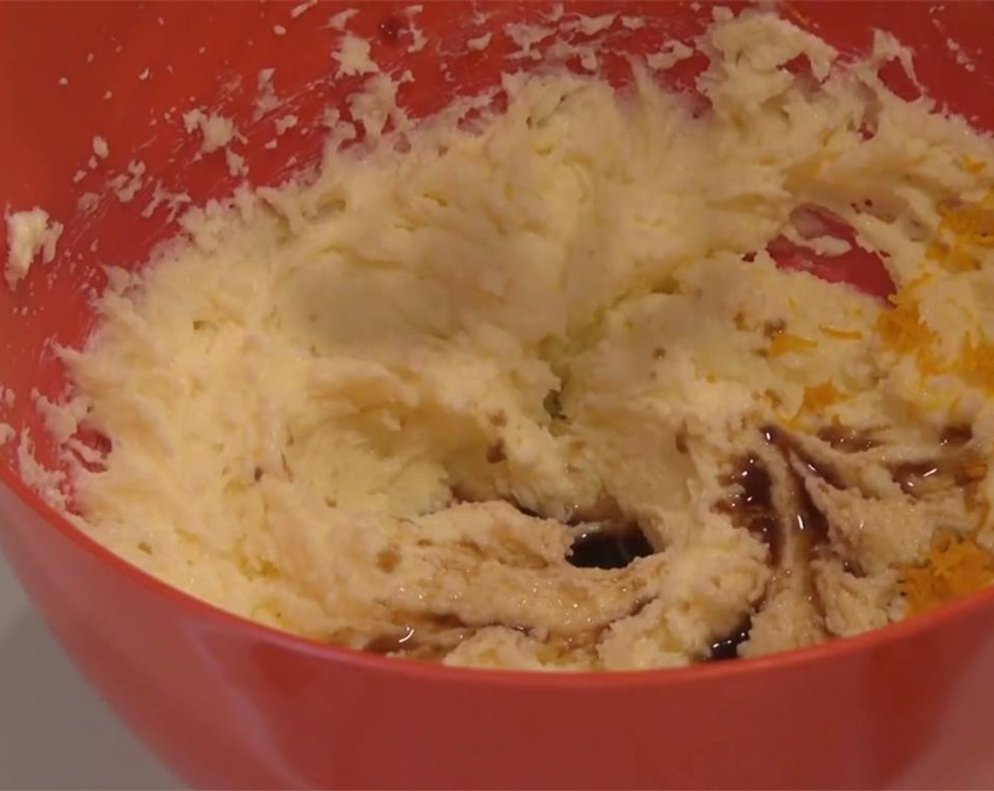 step 4 Add the zest from Orange (1) and Vanilla Extract (2 tsp), then mix well.