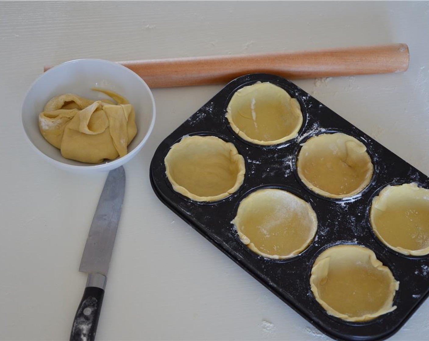 step 3 Press the circles into a muffin pan to form cups. Put the pan into the fridge until you are ready to fill the cups.