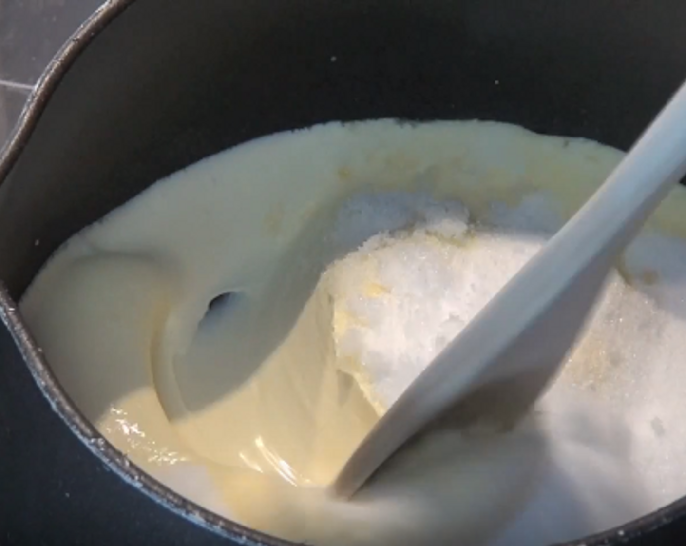 step 1 To a small saucepan, add Heavy Cream (1 1/4 cups) and Caster Sugar (1/3 cup). Over a low heat, stir together until the sugar is dissolved.