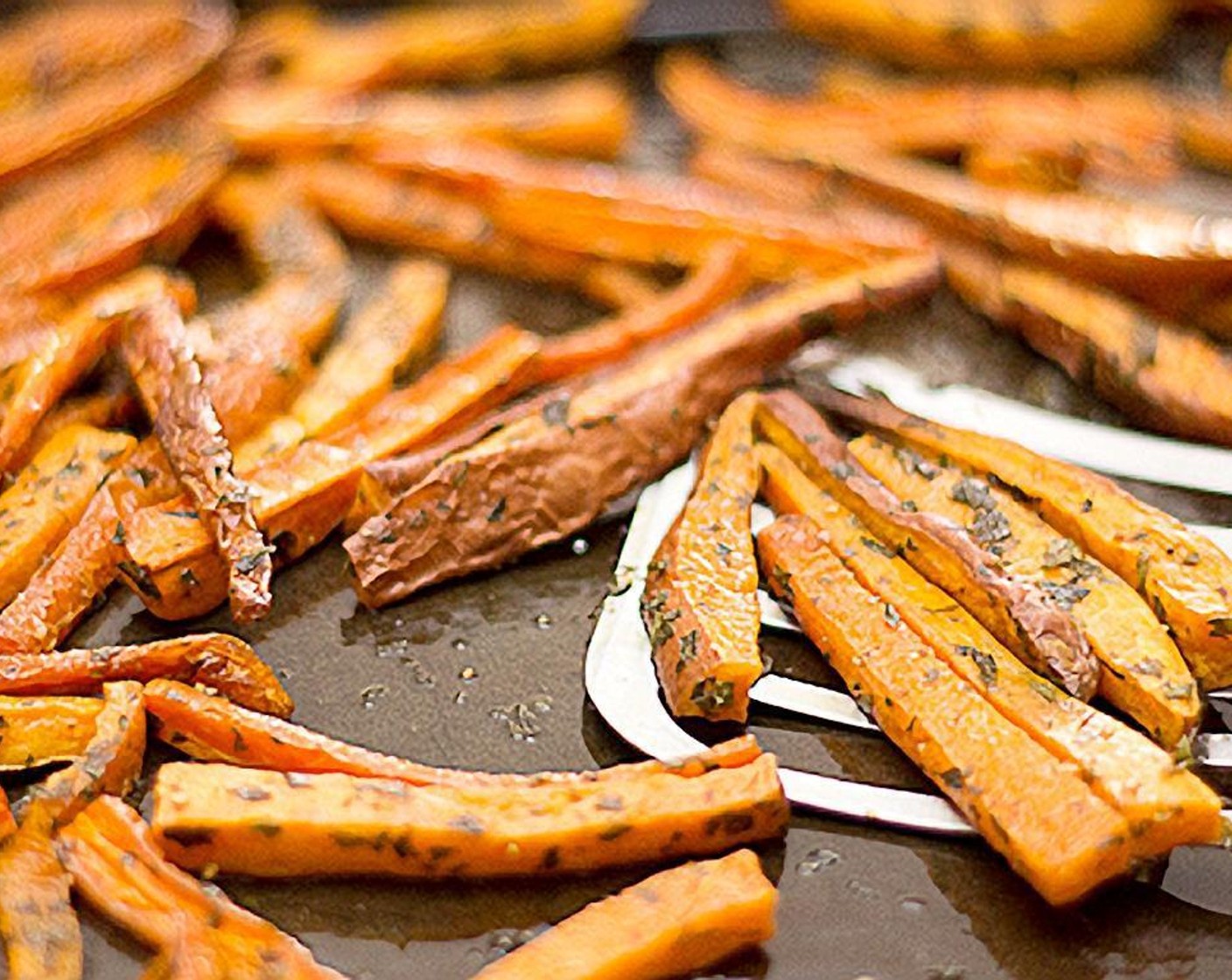 step 4 Arrange in a single layer and make sure to flip the fries over two or three times to brown evenly. Bake for about 35-40 minutes, or until golden brown and crisp. Keep an eye on them making sure not to burn.