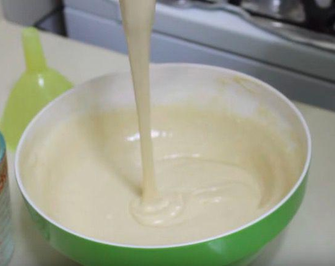 step 3 In a separate jug, combine the Milk (1 2/3 cups), Vanilla Extract (1 tsp), and Eggs (2) and whisk to combine. Pour the milk mixture into the flour mixture, and mix until there are no lumps.