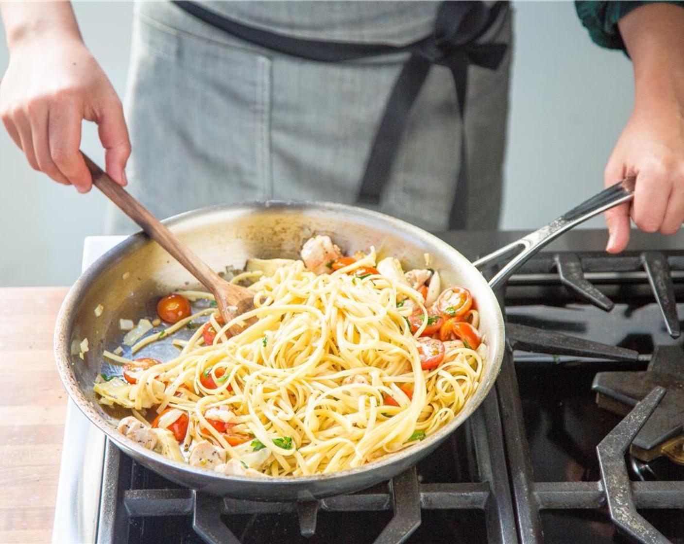 step 5 Reduce heat to medium and add the Artichoke Hearts (2/3 cup), Cherry Tomato (1 cup), Feta Cheese (2/3 cup), Fresh Parsley (3 Tbsp), Lemon (1), and Dried Oregano (1 tsp). Cook for 3 minutes until well combined.