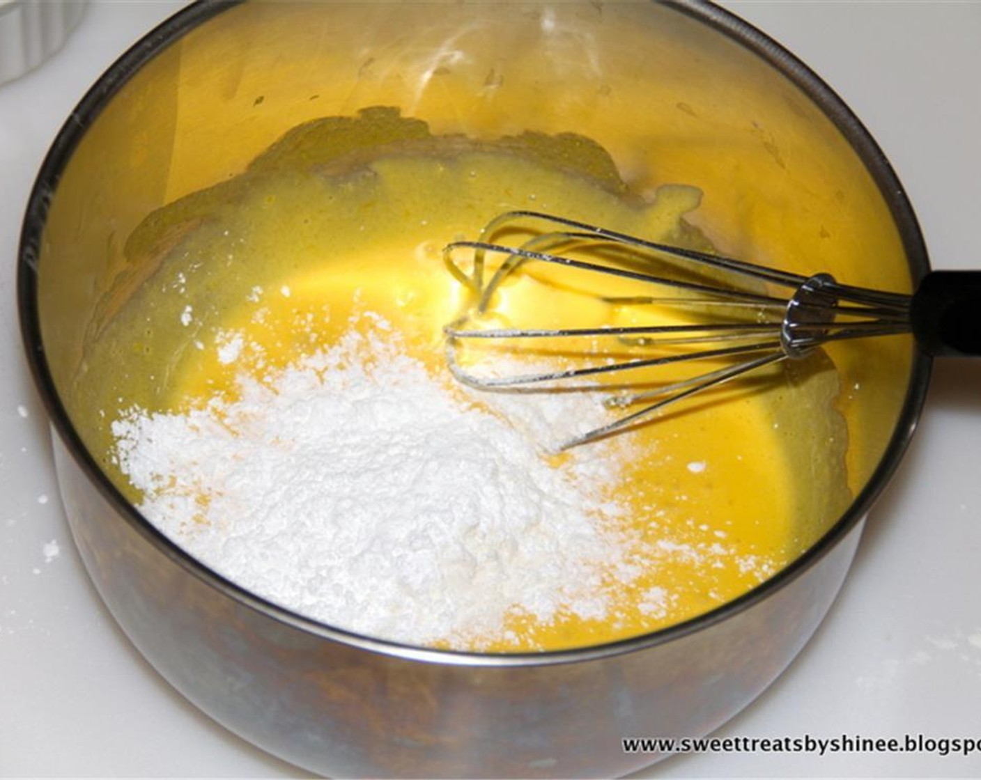 step 3 Beat Eggs (4) with Granulated Sugar (1/3 cup) until pale yellow. Add flour mixture and continue stirring.