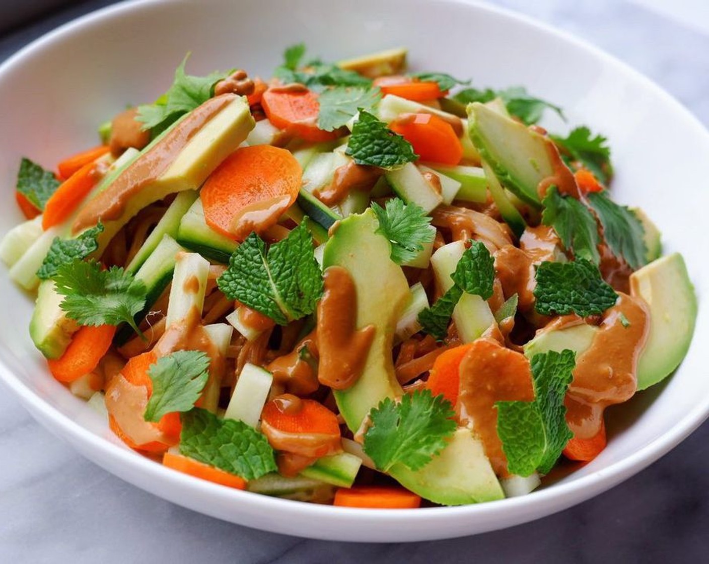 Ginger Peanut CBD Noodles with Crunchy Vegetables and Fresh Herbs