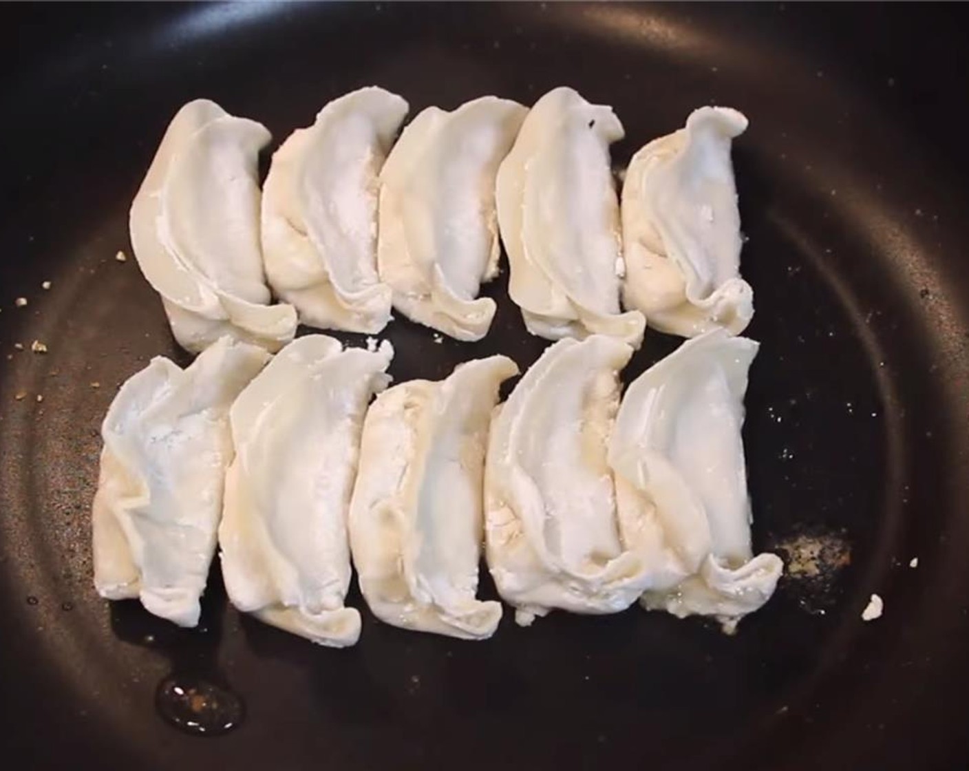 step 13 Cook dumplings in batches of 8-10 at a time. Cook for about 30 seconds or until the bottom is golden brown.