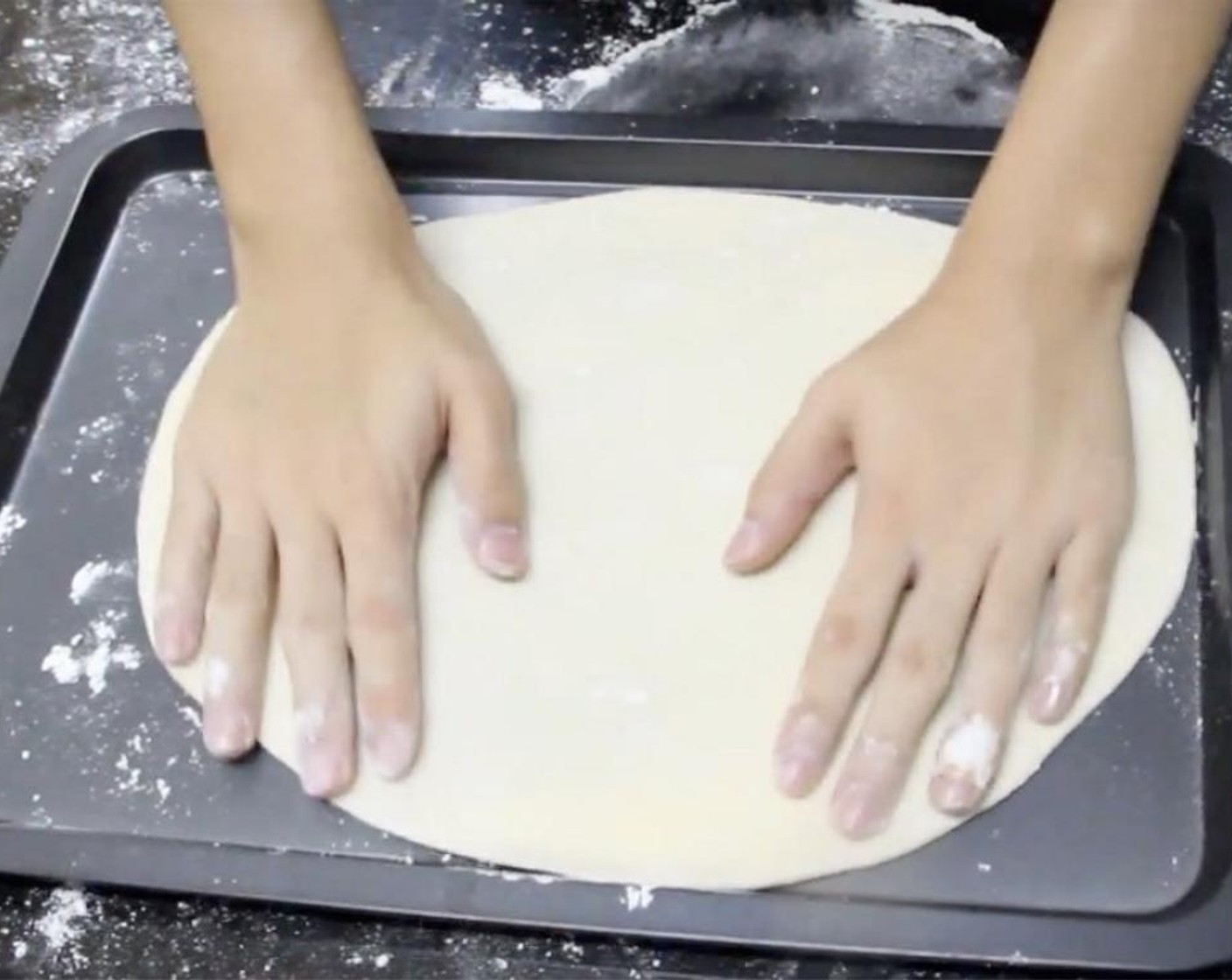 step 10 Place on a baking tray dusted with some flour.