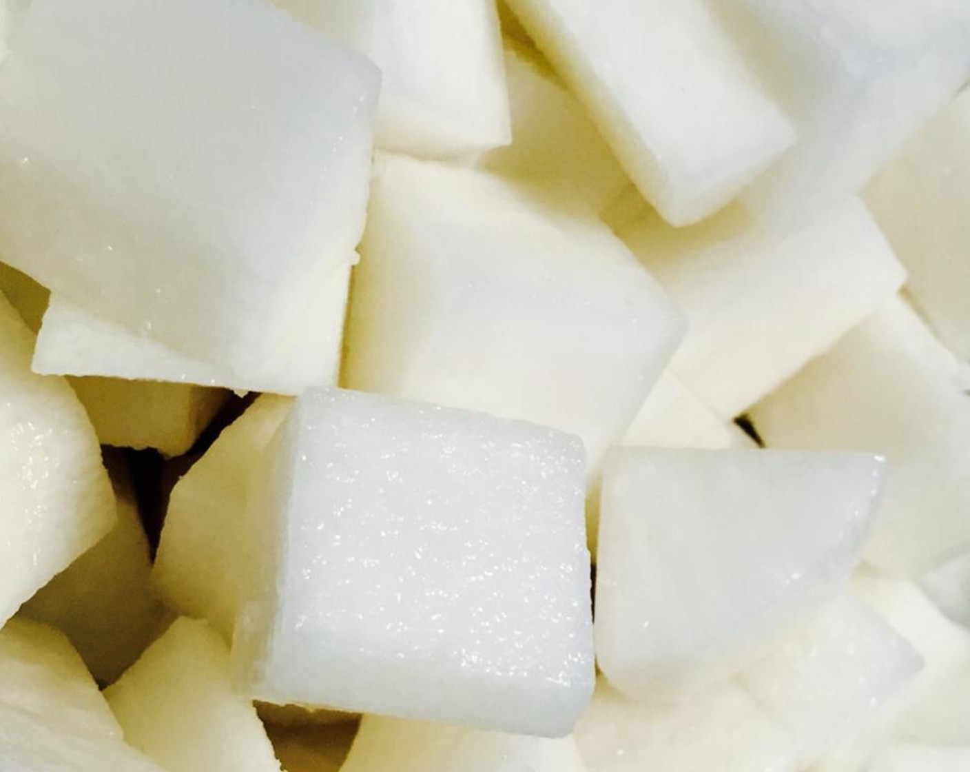 step 2 Put the white radish cubes in a bowl or strainer and toss with the Salt (1 Tbsp). Allow 30 minutes for the salt to draw out the water. Make sure water has been removed.
