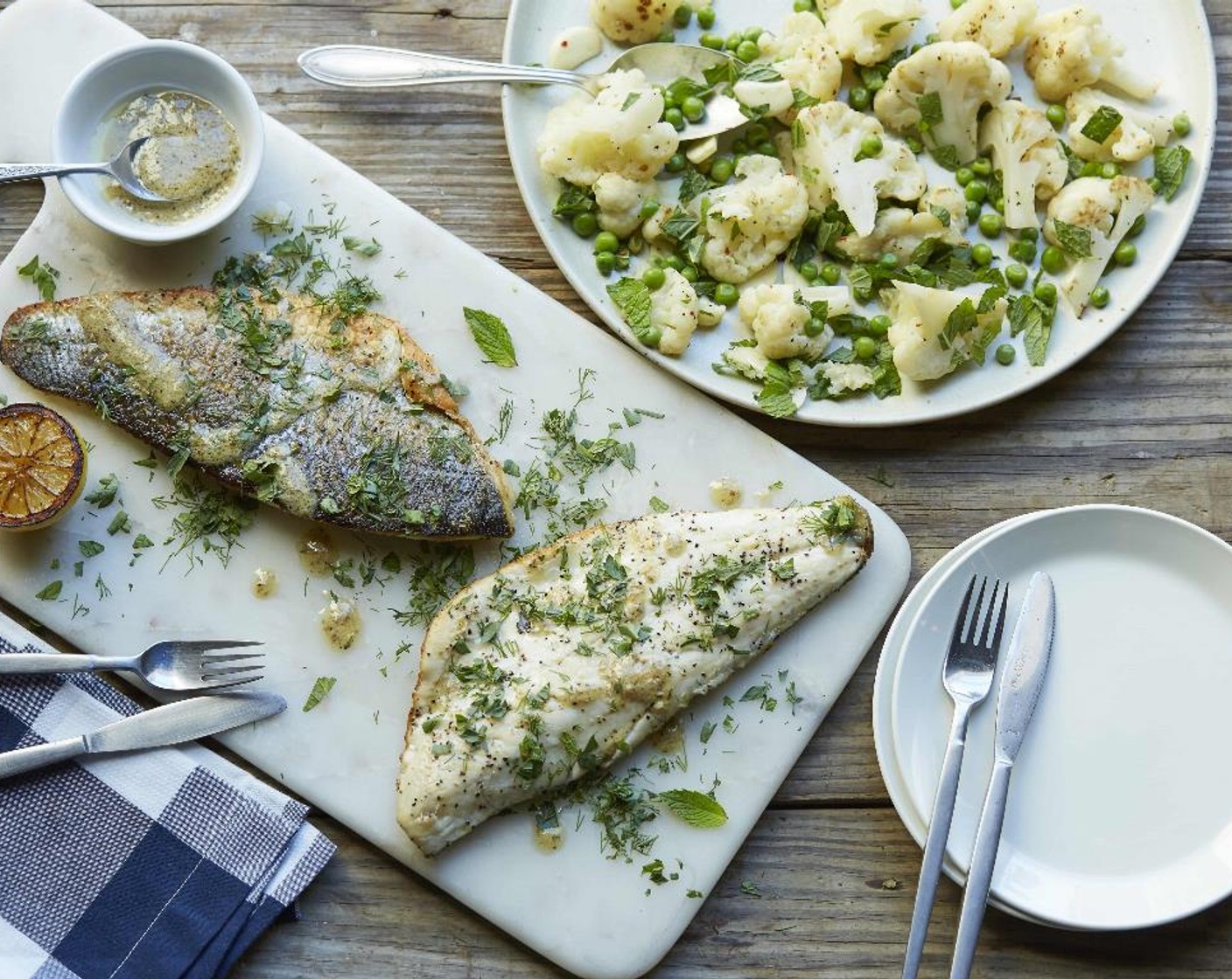 step 18 Serve the Garlic Roasted Cauliflower with peas and mint divided equally among 2 plates or place on a platter to serve family style.