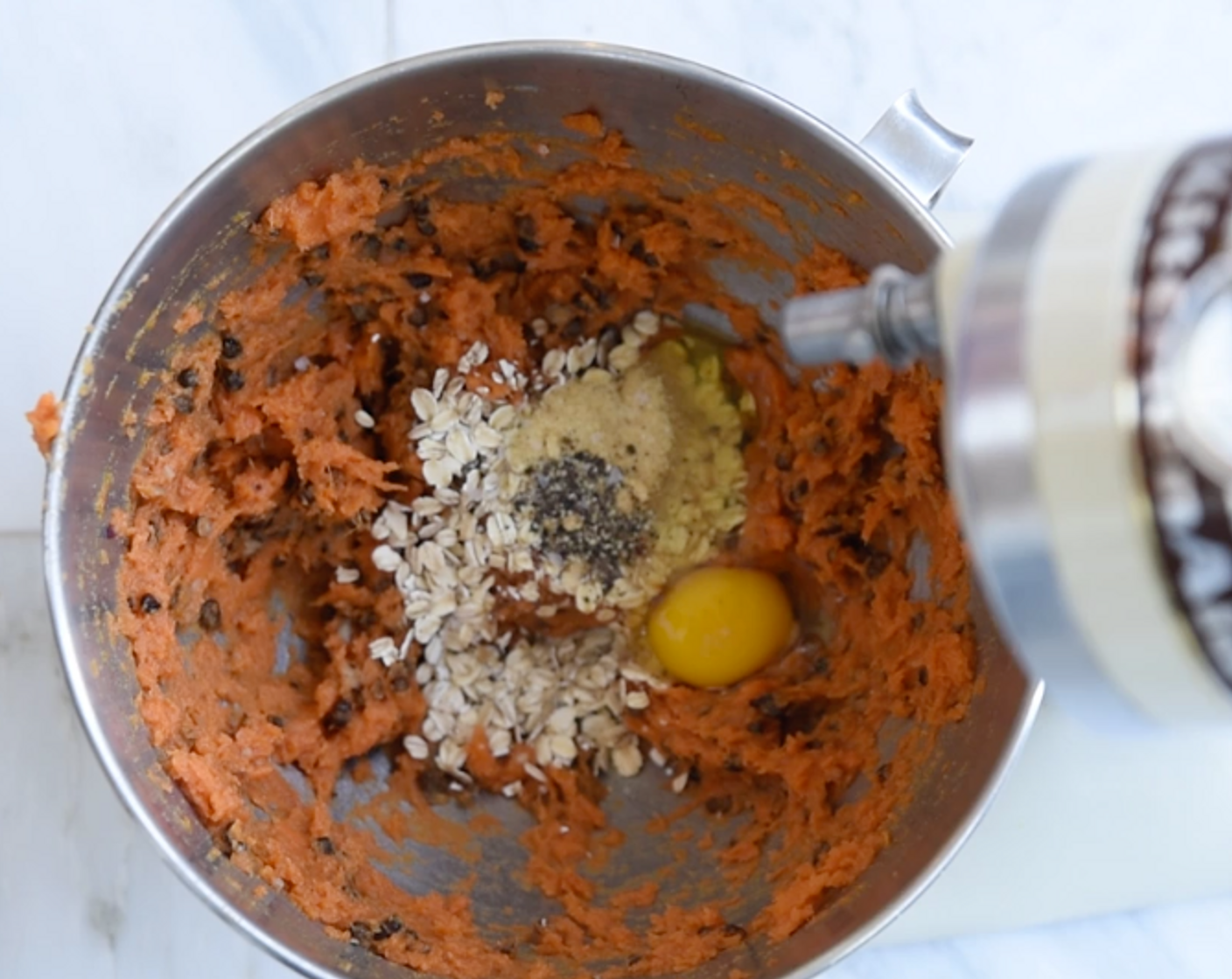 step 3 In a large mixing bowl, combine Black Beans (1 cup), Sweet Potato (1 cup), Quick Cooking Oats (1/2 cup), Egg (1), Onion Powder (1/2 tsp) and Ground Black Pepper (1/4 tsp). Stir until ingredients are evenly distributed.