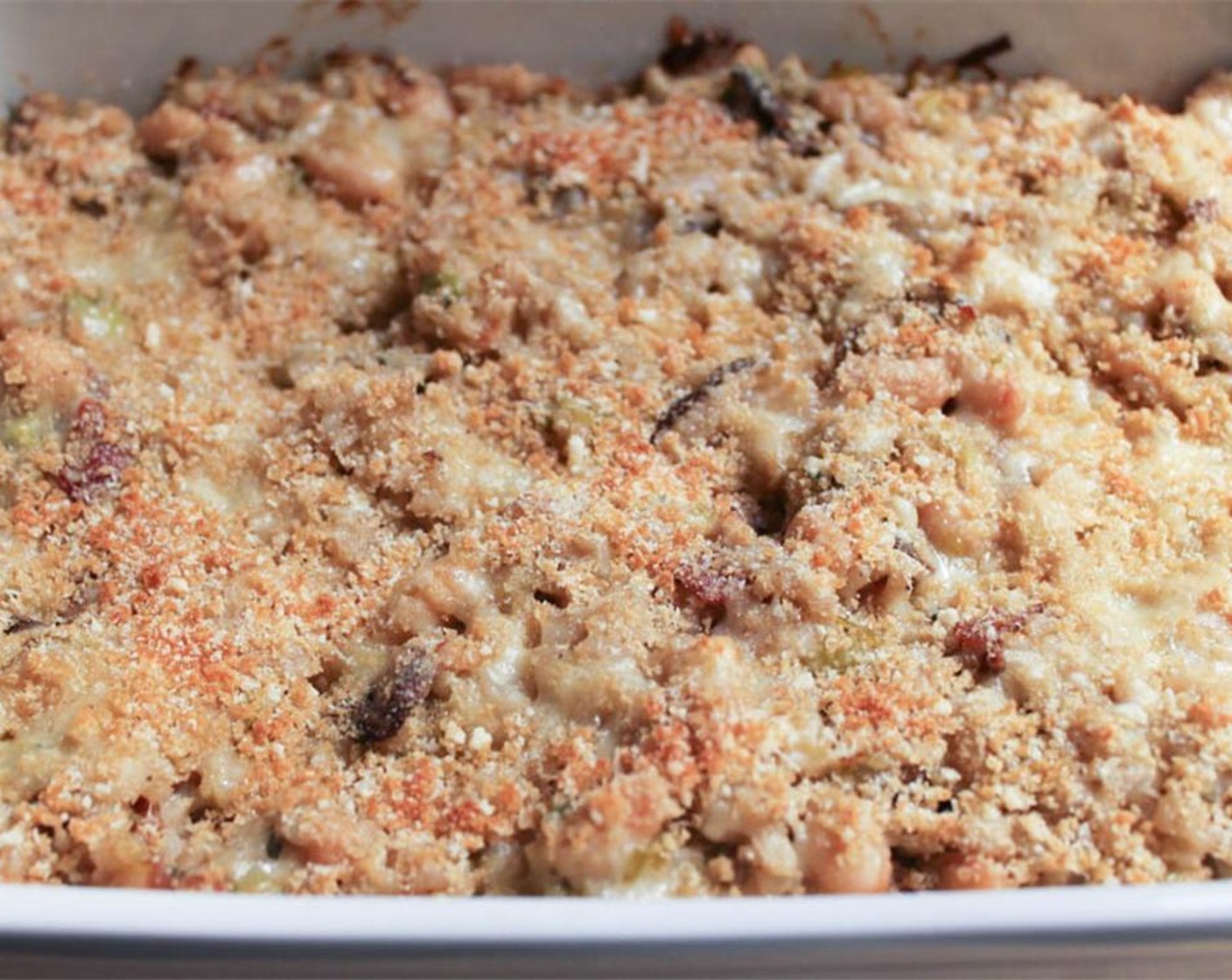 step 17 Transfer the casserole to the oven and bake for 25 minutes until the cheese is bubbling and the top is lightly browned.