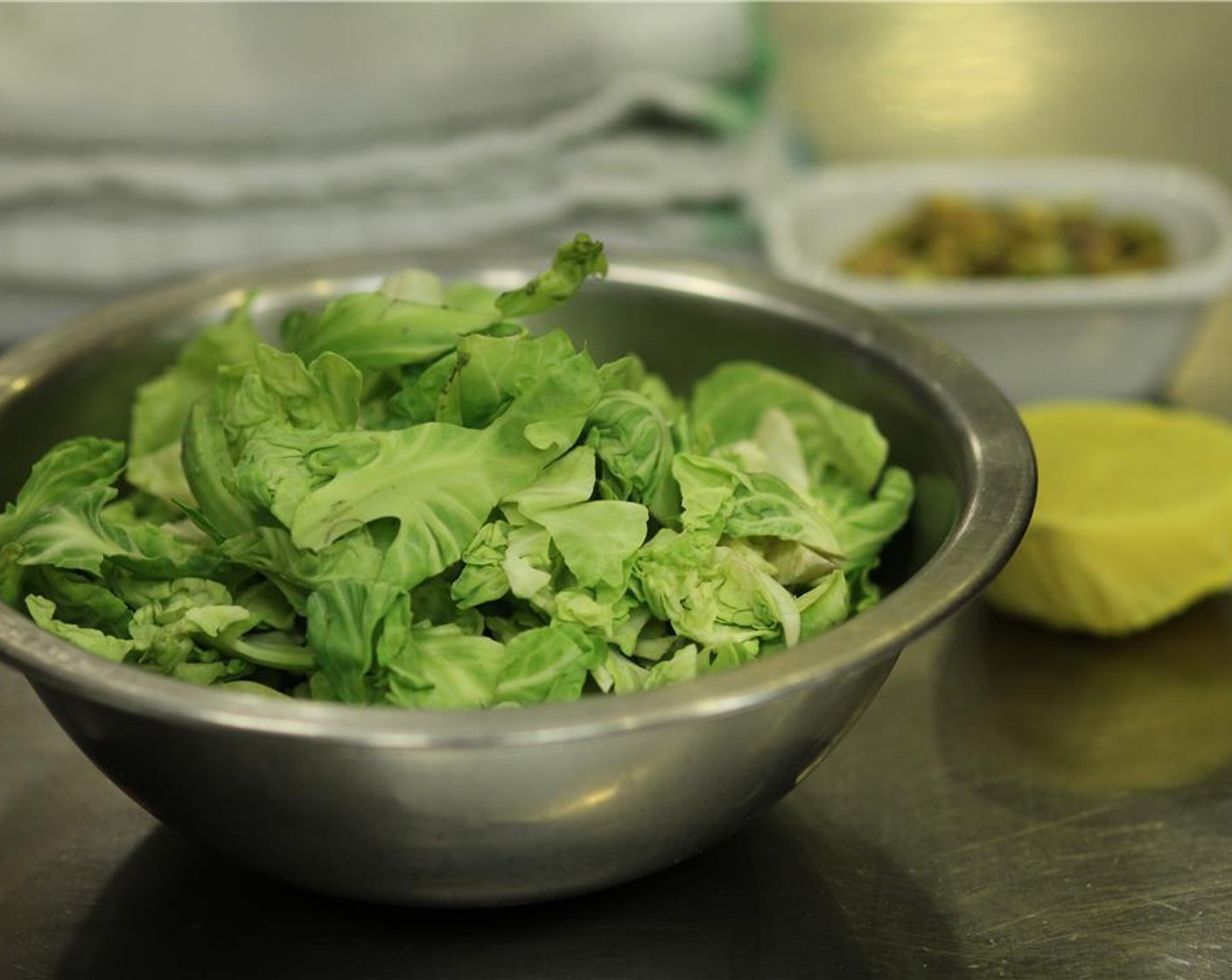 step 2 Slice off the stems of the Brussels Sprouts (2 cups). Begin pulling away the brussels sprout leaves and place them in a bowl. You will only need the brussels sprout leaves, so discard the cores and any damaged outer leaves.