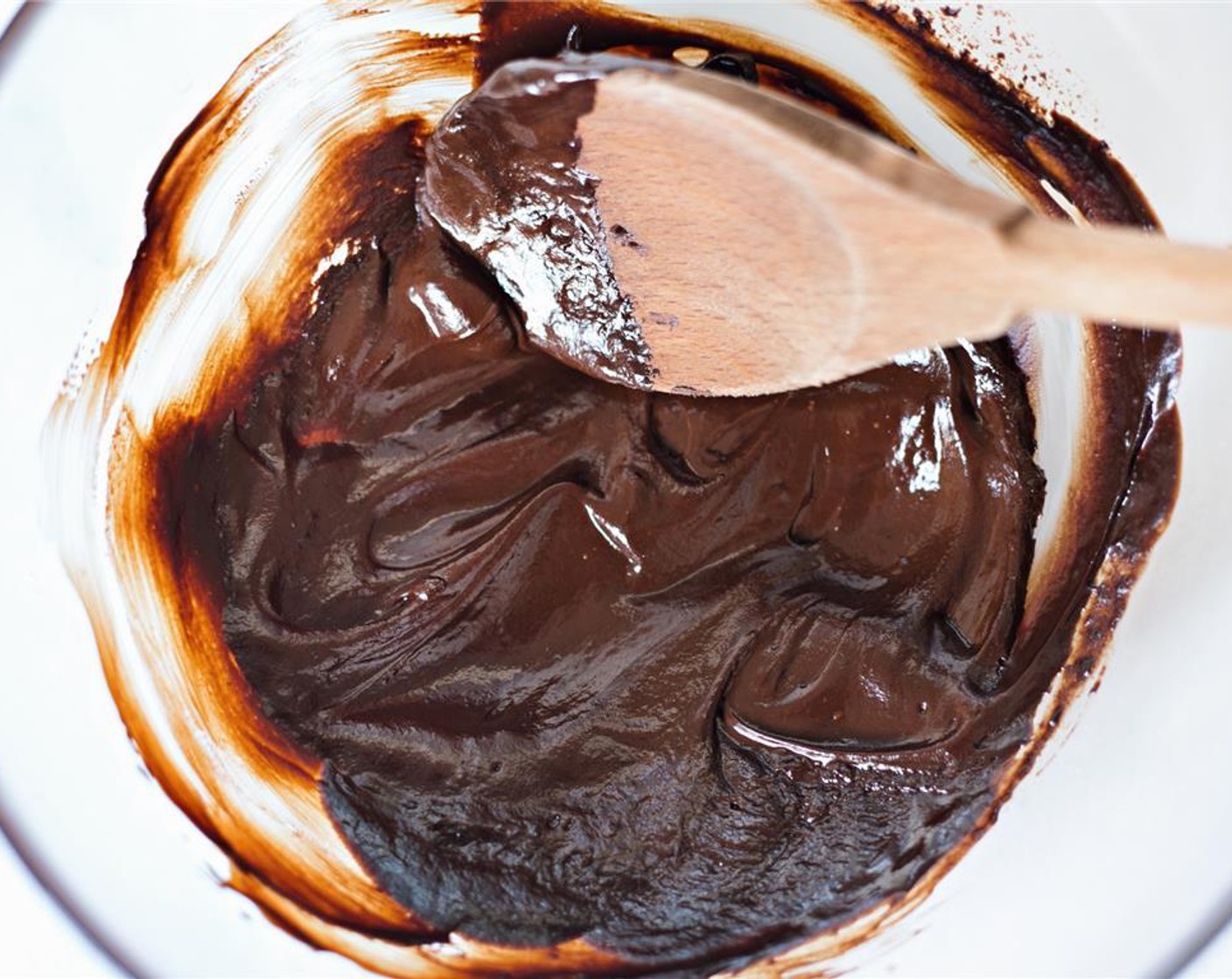 step 23 Melt Dark Chocolate (1/4 cup) over a saucepan with simmering water. Stir until melted, about four minutes.