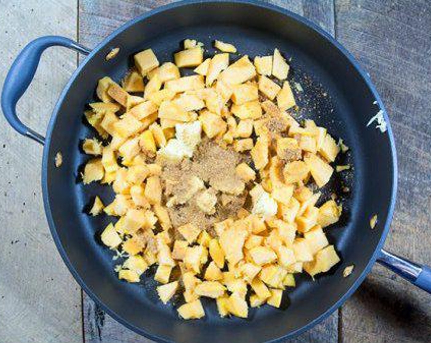 step 5 Melt Unsalted Butter (2 Tbsp) in a large skillet over medium-high heat. Add Coconut Sugar (2 Tbsp) and Acorn Squash (2 cups) then saute, stirring every so often under the squash is tender and caramelized for about 15 minutes.