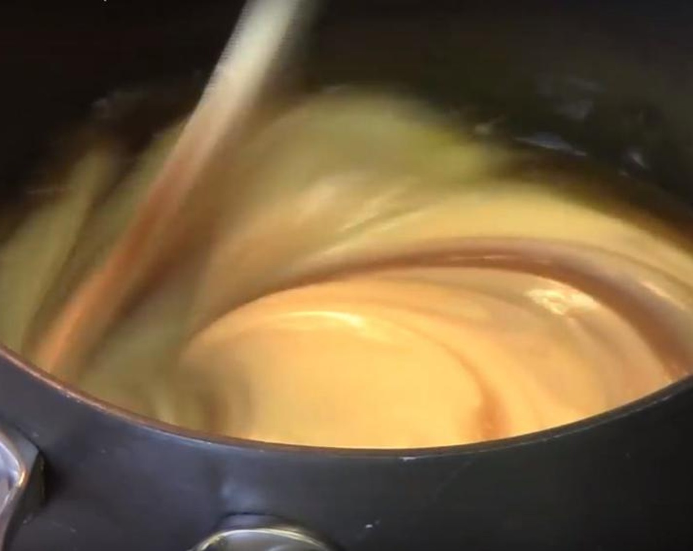 step 2 For the filling: Put Butter (1/3 cup) into a sauce pan. Add in Brown Sugar (1/2 cup) and stir until the butter has melted. Add in La Lechera® Sweetened Condensed Milk (1 1/3 cups) and stir it in. Stir over a low heat for about five minutes.