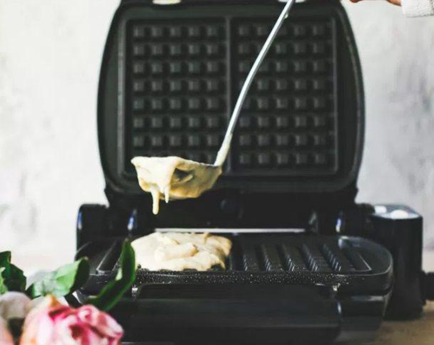 step 6 Spray the preheated waffle maker with non-stick spray, and pour batter in. Set to highest heat. Flip over after a few minutes. Waffles are done when they are golden. Immediately place on a cooling rack to keep crispy.