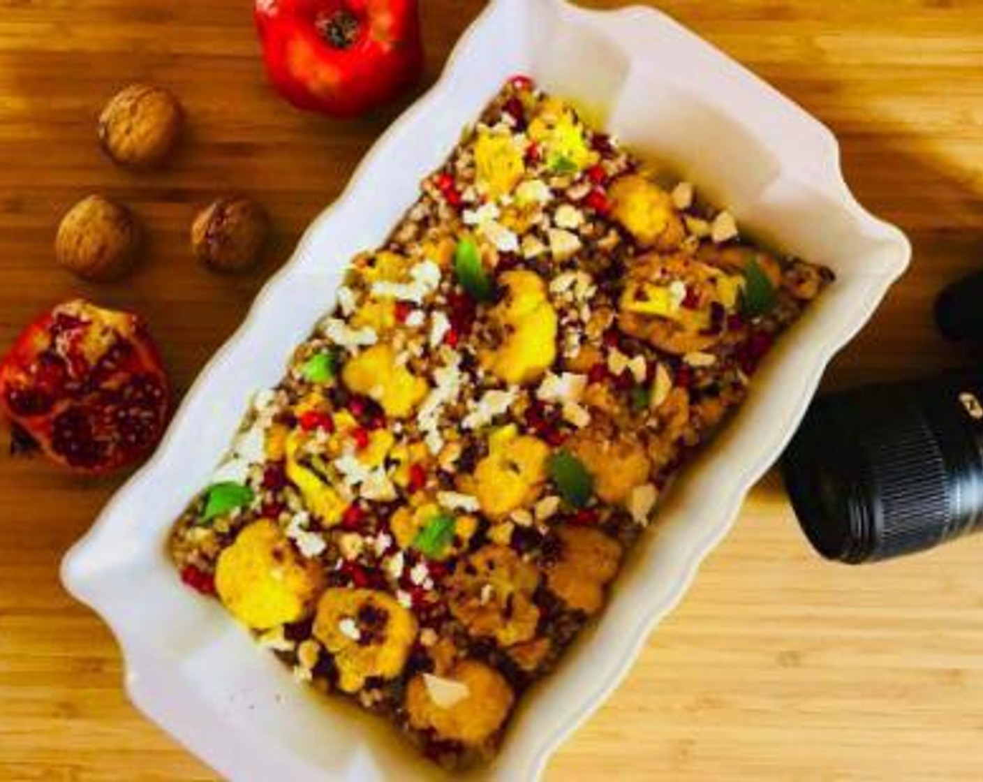 step 4 Combine the roasted cauliflower and barley into a large serving dish. Crack a few Walnuts (4) and deseed one Pomegranate (1). Add them to the barley and cauliflower together with some Feta Cheese (1/2 cup).
