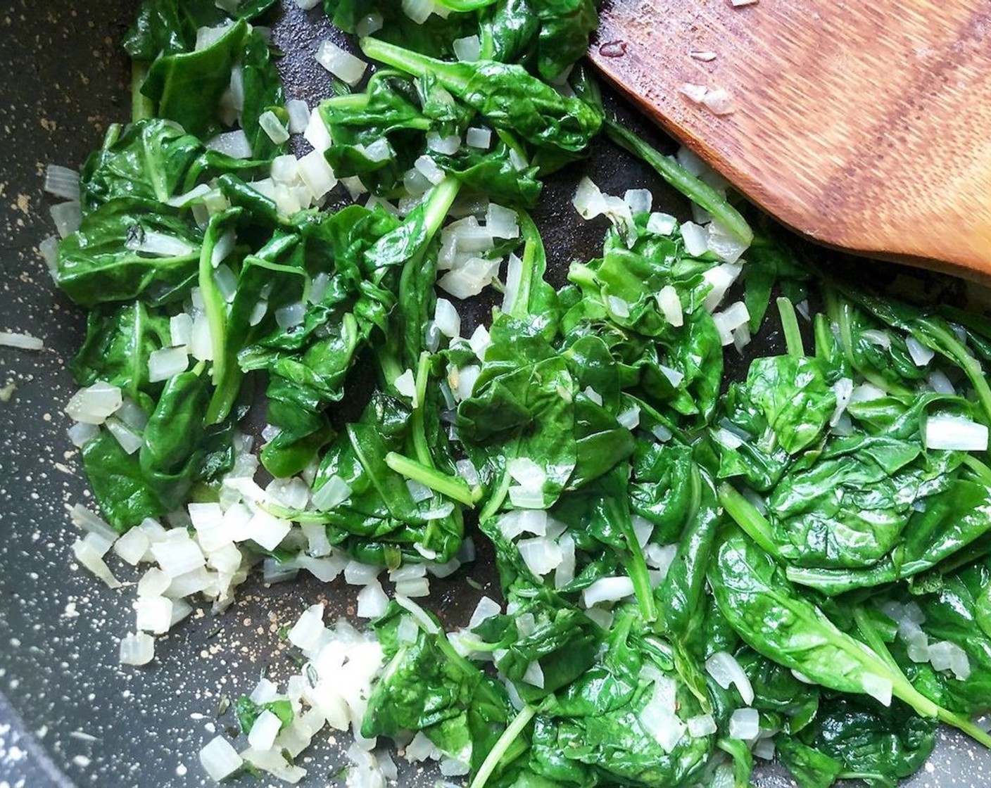 step 4 Add the Fresh Baby Spinach (4 3/4 cups) to the skillet and cook for an additional 1 to 2 minutes until the spinach is wilted. Transfer to a strainer set over a bowl, drain well and set aside.