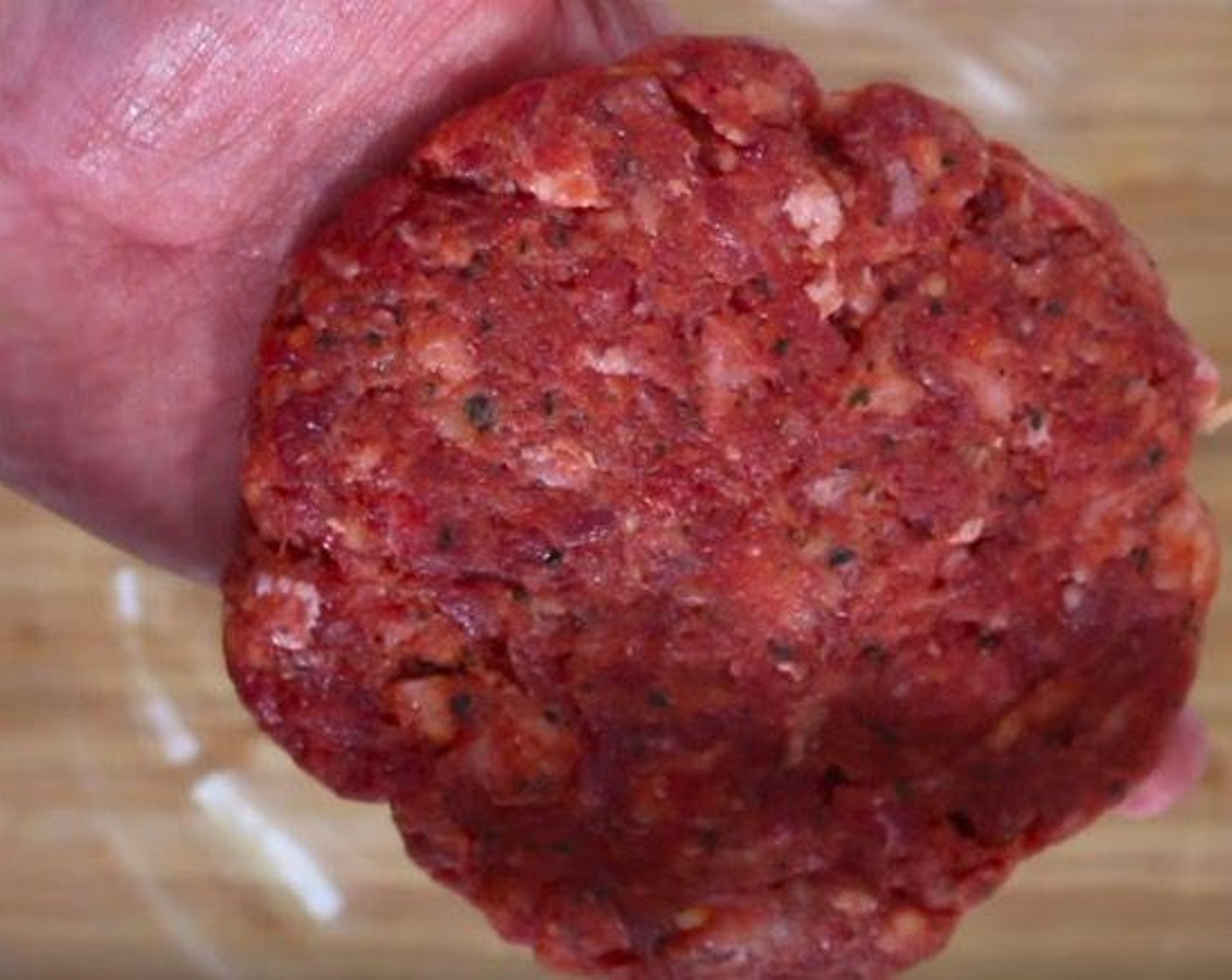 step 3 Shape 80/20 Lean Ground Beef (1 lb) into three patties, thicker than the average McDonald's burger. Rub each side with some Fresh Rosemary (1 sprig).
