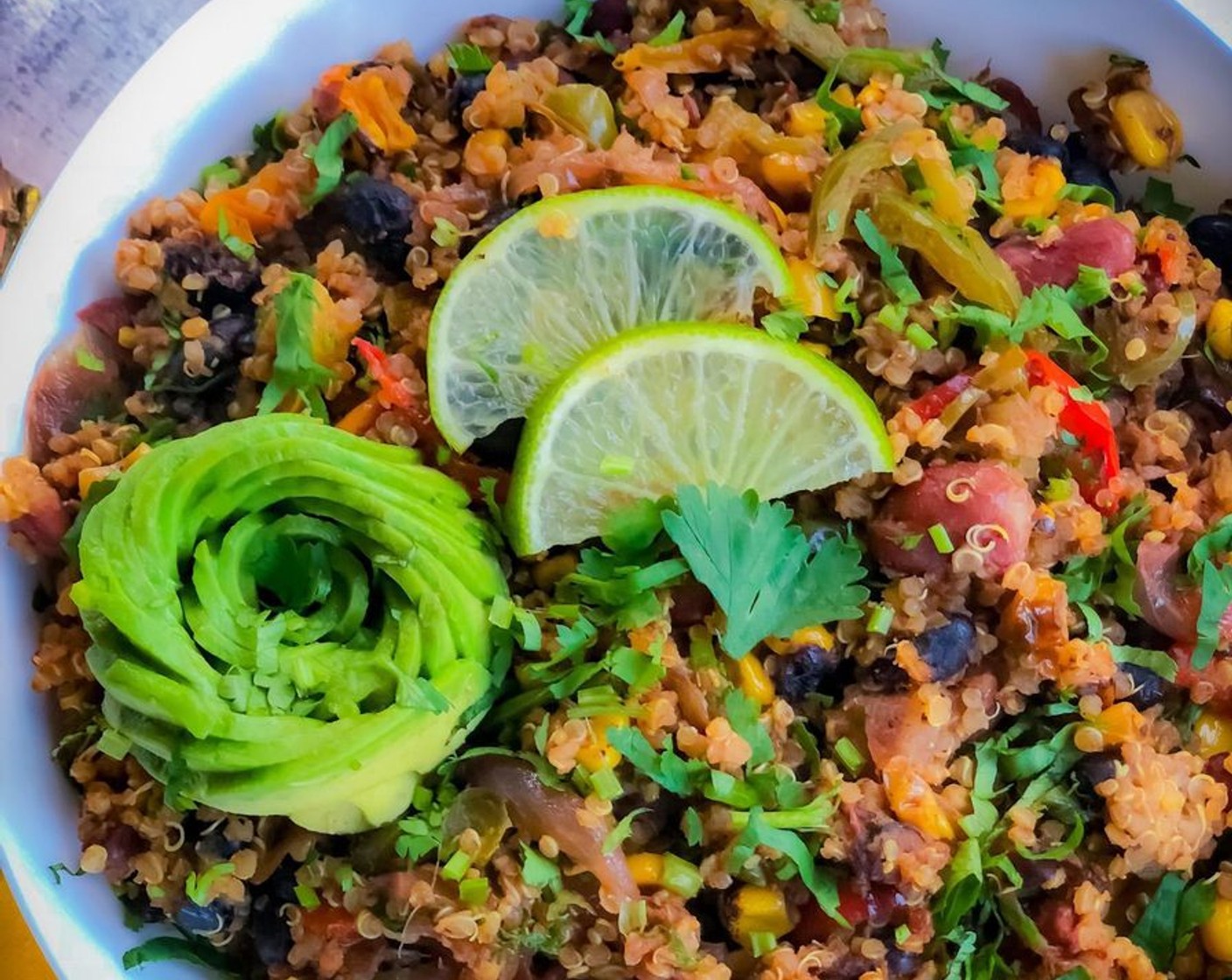 step 6 At the end add the juice from Lime (1/2) and a handful of Fresh Cilantro (1 handful) into the quinoa and combine everything. Your Mexican quinoa is ready to serve! Add some avocado on top if you want.