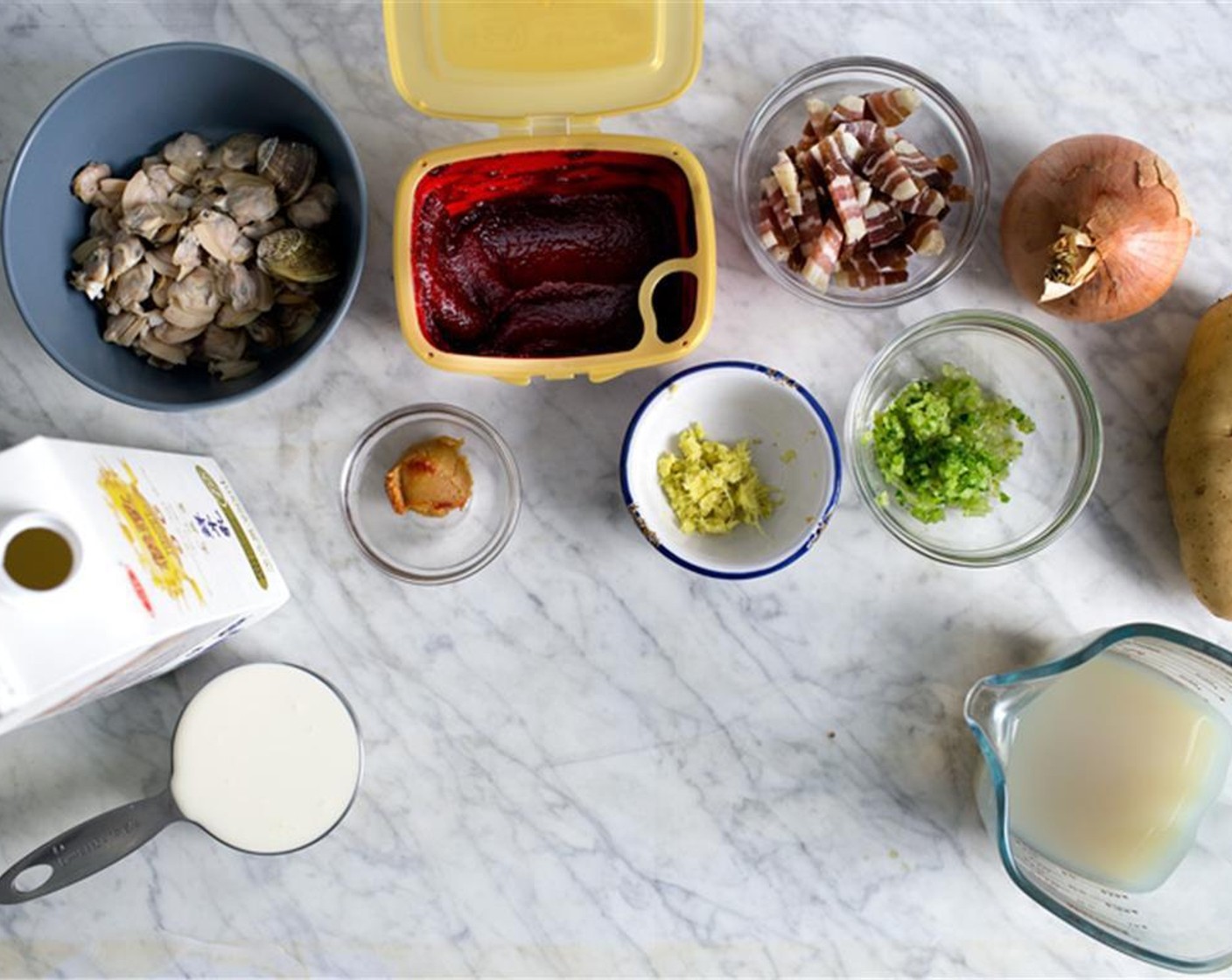 step 4 In a large pot, cook Olive Oil (1 Tbsp) and Pancetta (1/3 cup) over medium heat until the fats are rendered and the pancetta is browned.