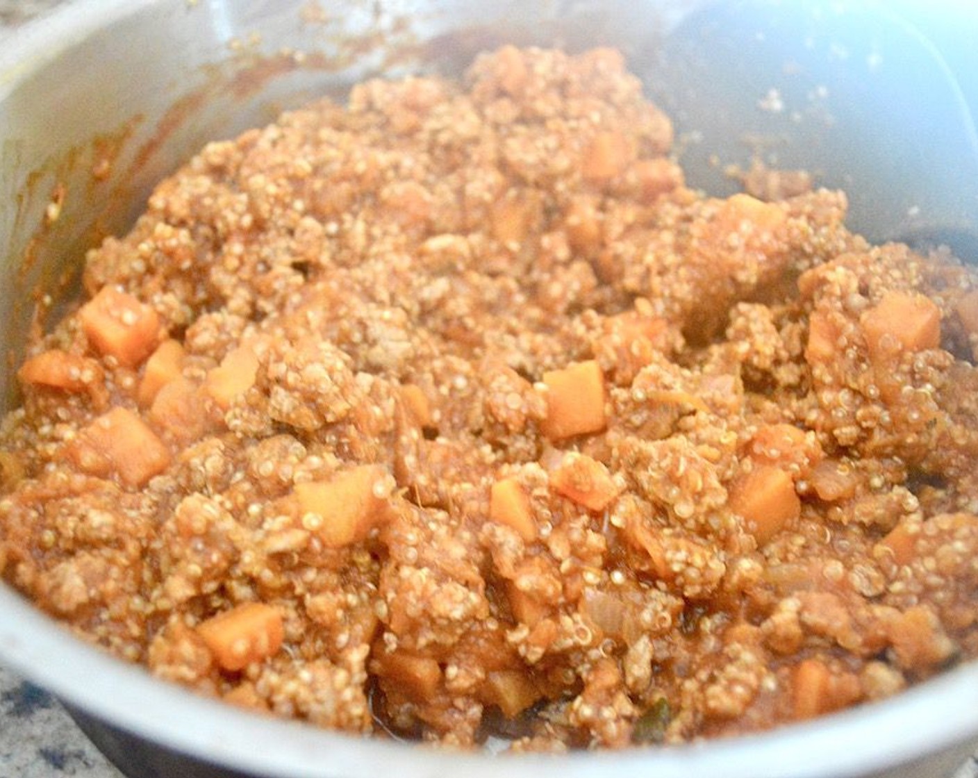 step 6 Fluff up the quinoa up when it is done, then stir it into the rest of the filling mixture.