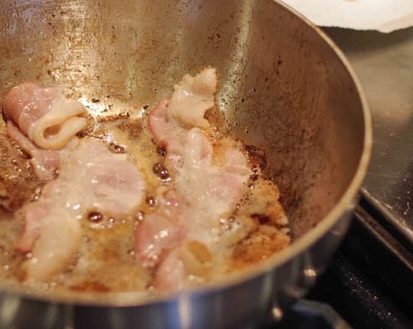 step 4 Add Bacon (8 oz) to skillet and cook over medium heat until crispy. Remove bacon to a paper towel-lined plate. Once the bacon has cooled, chop it into small bits.