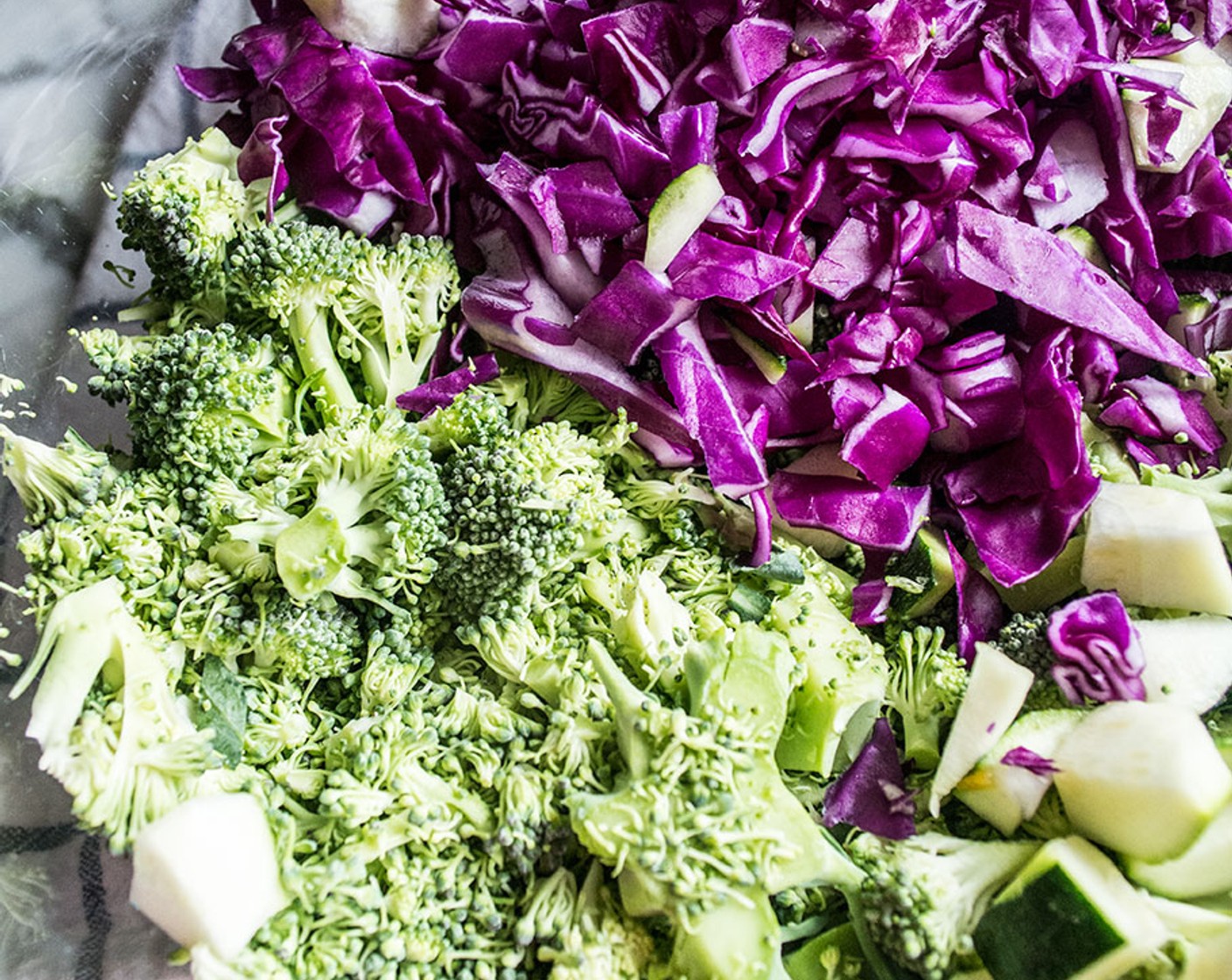 step 3 Add Bell Peppers (2), Broccoli (4 cups), Zucchini (1 1/2), and Red Cabbage (2 cups) to a skillet and cook 3-5 minutes.