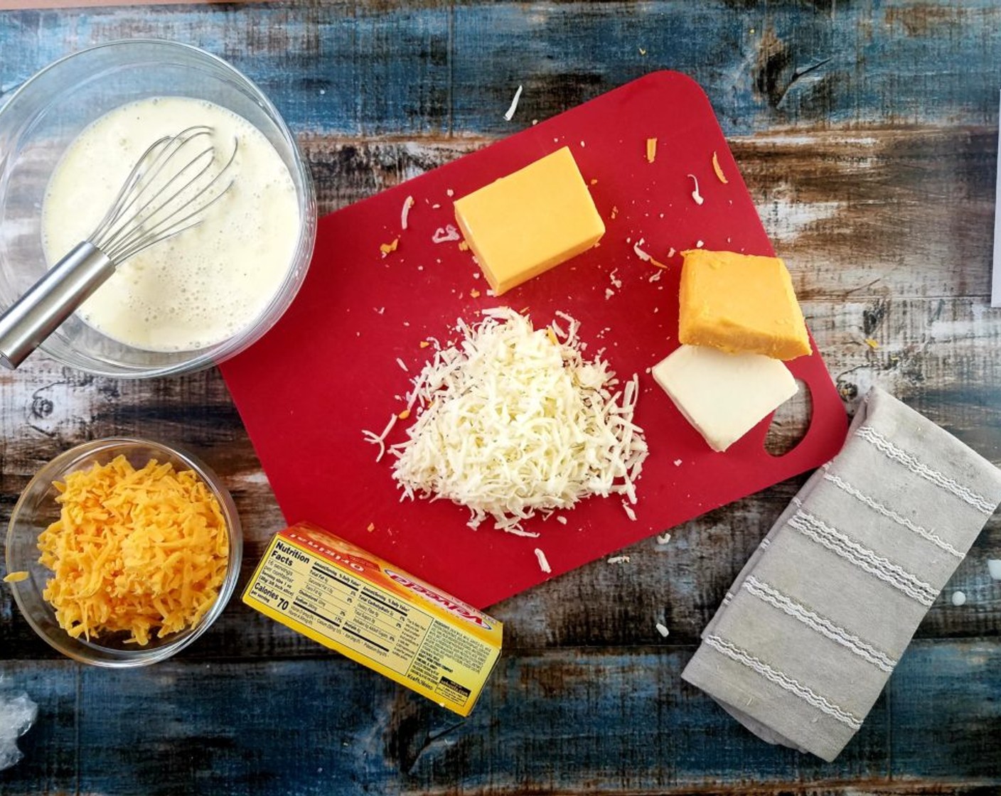 step 1 Cube the Velveeta® Original Pasteurized Cheese Product (2 cups), and shred the Sharp Cheddar Cheese (1 cup) and Monterey Jack Cheese (3/4 cup).