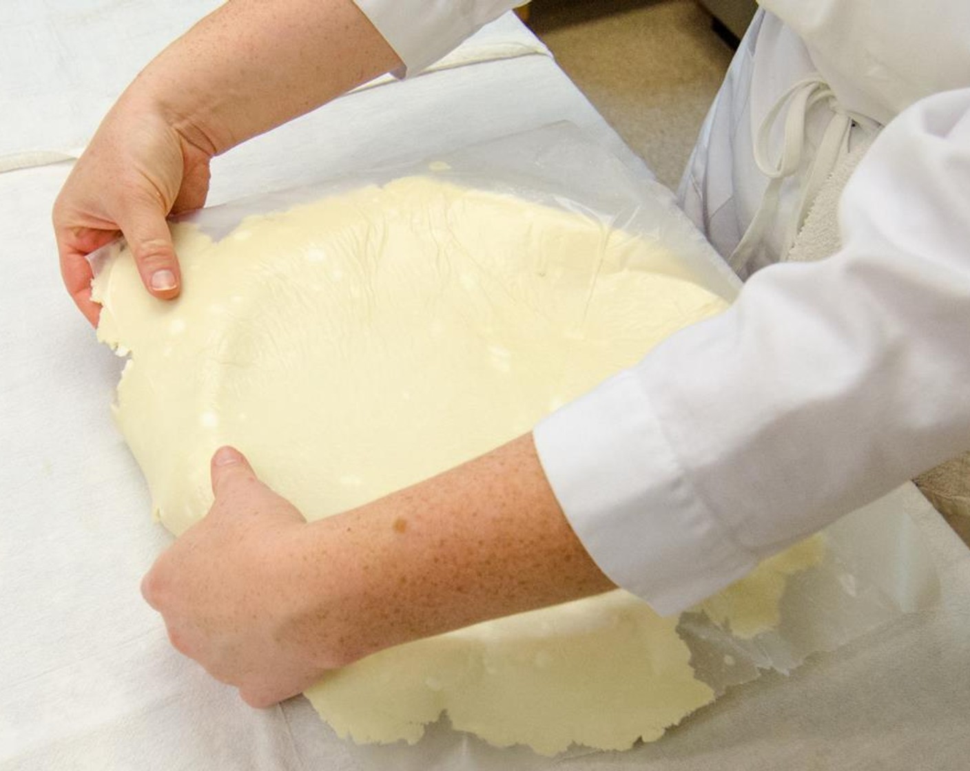 step 17 Invert and press dough into a 9-inch pie pan. Remove remaining plastic wrap.