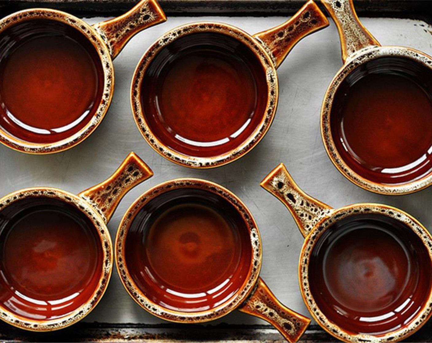 step 1 Preheat oven to 375 degrees F (190 degrees C) and place a 9×13 baking dish on a baking sheet, or arrange 6-8 individual ramekins on a baking sheet. Set aside.