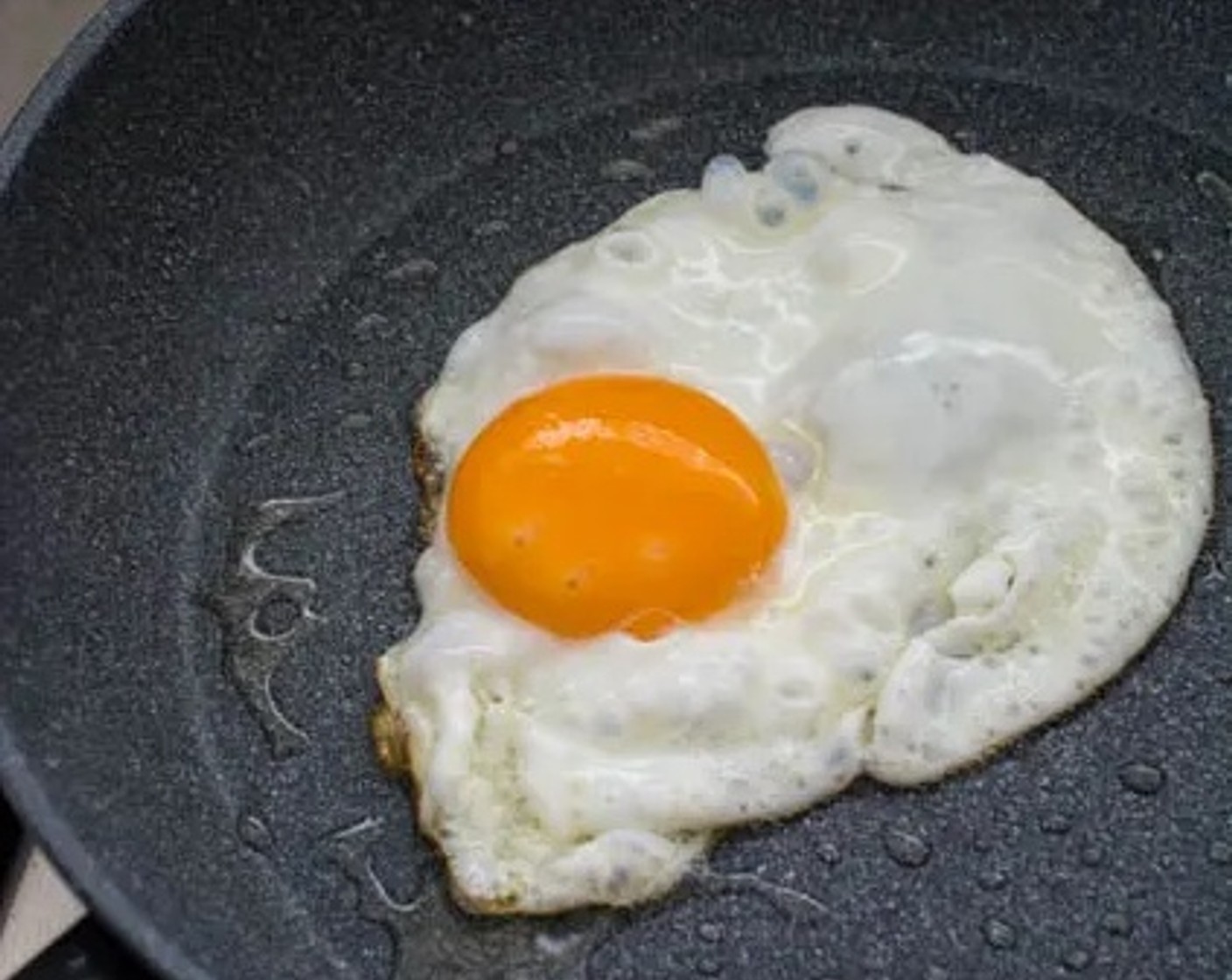 step 5 Just before serving, in a small non-stick frying pan, fry Eggs (4) using the remaining Cooking Oil (2 Tbsp).