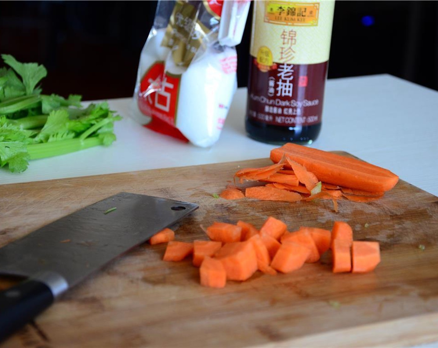 step 2 Finely chop the Carrot (1/2). Chop the Chicken Breasts (12 oz) into small pieces.