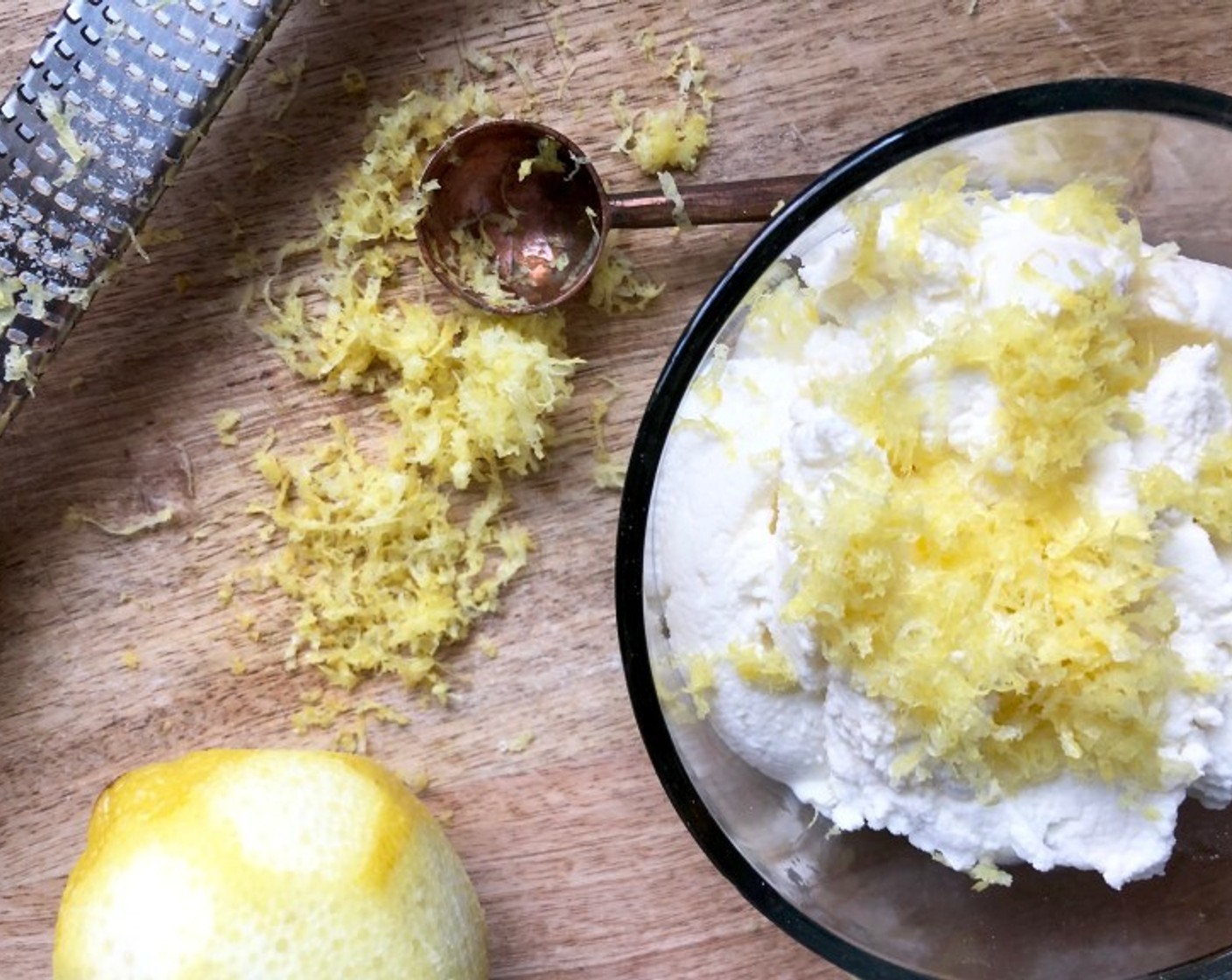 step 6 Stir together Cheese (1 cup) and 2 tsp of Lemon Zest (1) in a medium bowl. Divide the ricotta mixture evenly among the cooked sides of dough circles.