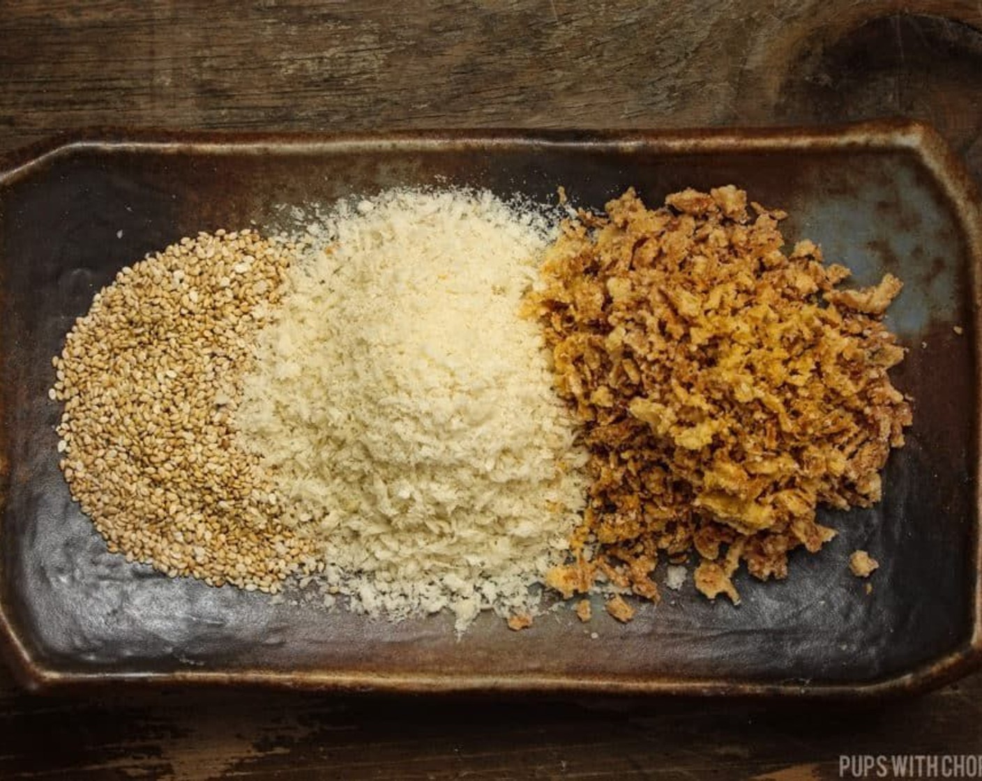 step 5 Set the stove to low heat and add a bit of oil. When the pan is hot, add in the Sesame Seeds (1 Tbsp), Panko Breadcrumbs (3 Tbsp) and Fried Onions (3 Tbsp) keep mixing so it doesn’t burn.