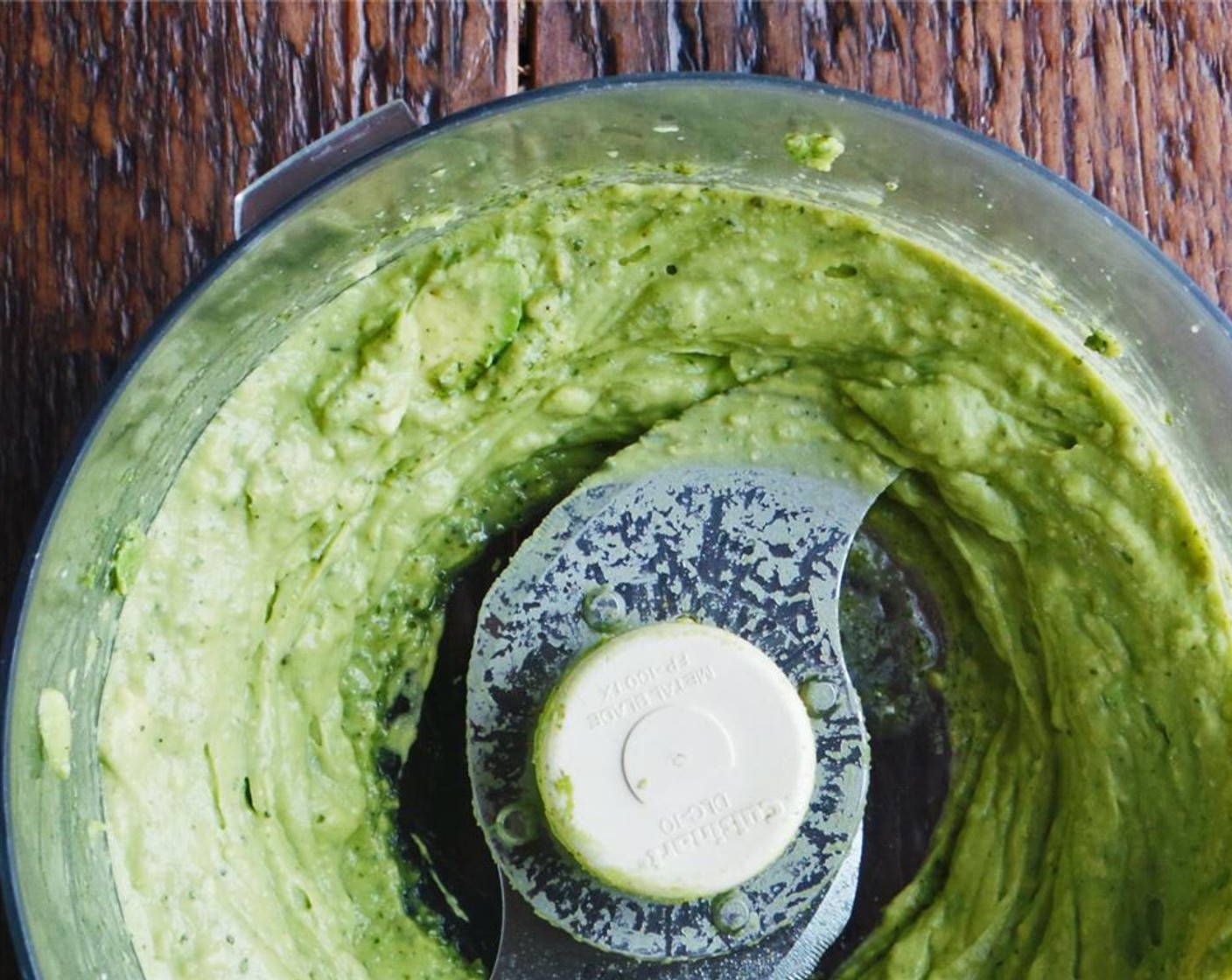 step 2 Halve, peel, and remove the pit from the Avocados (4). Add them to a food processor with the Basil Pesto (1/4 cup) and pulse until smooth and creamy.
