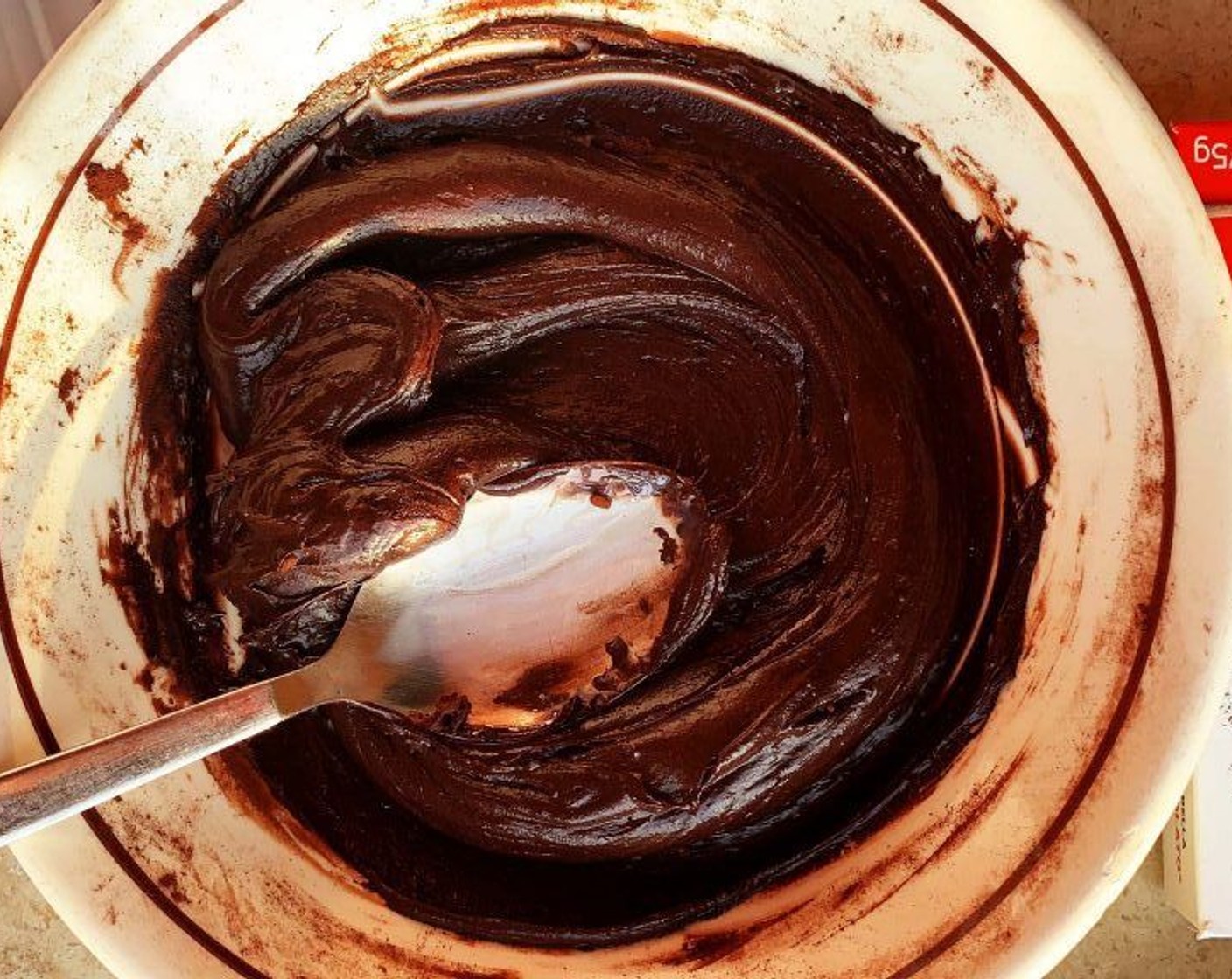 step 2 In a large bowl, stir together Sweetened Condensed Milk (1/3 cup) and Unsweetened Cocoa Powder (1/2 cup). Add the Salt (1/4 tsp).
