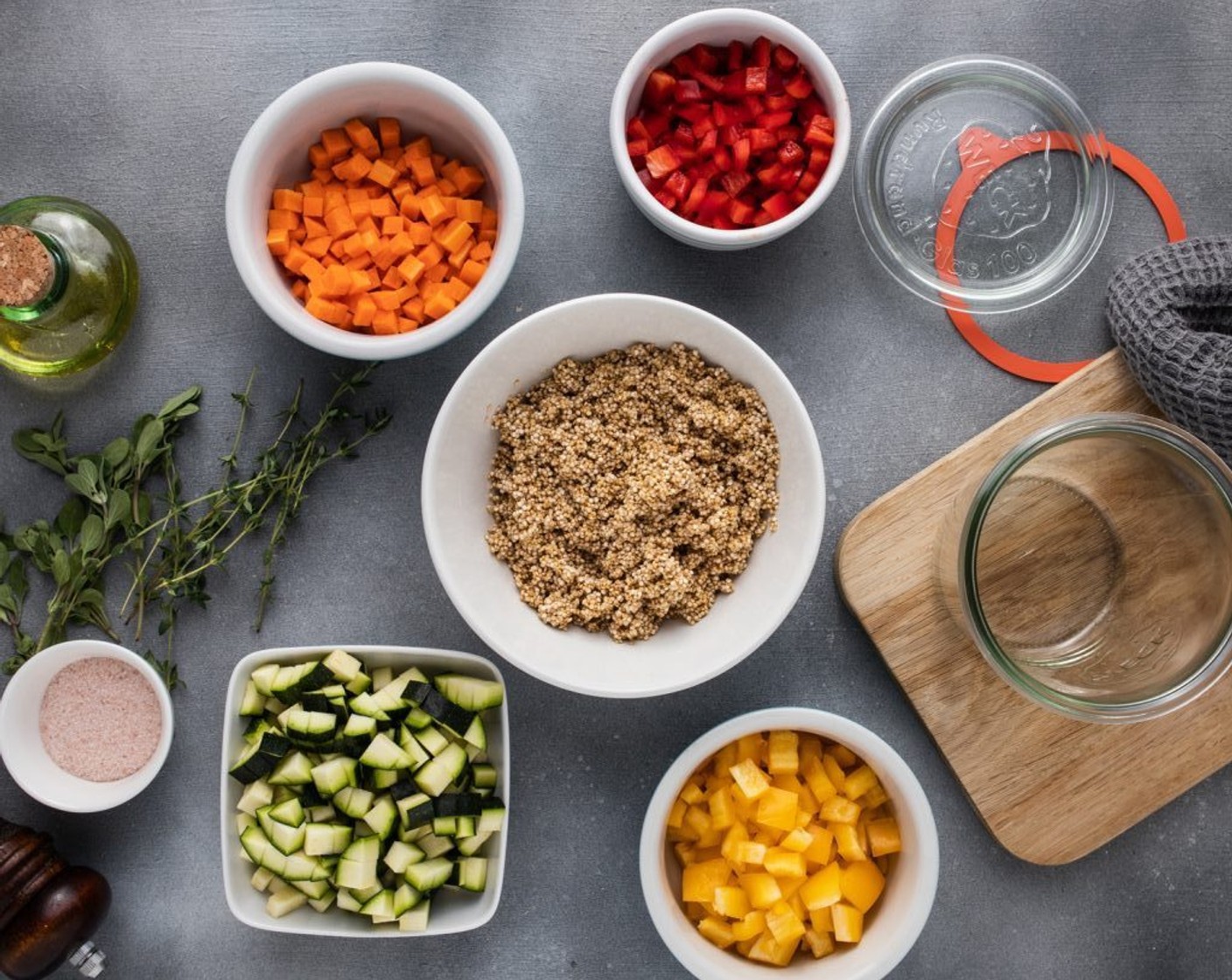 step 1 Thoroughly wash the Quinoa (3/4 cup) and all the vegetables, and then cut the Bell Peppers (2), Carrot (1), and Zucchini (1) into small cubes.