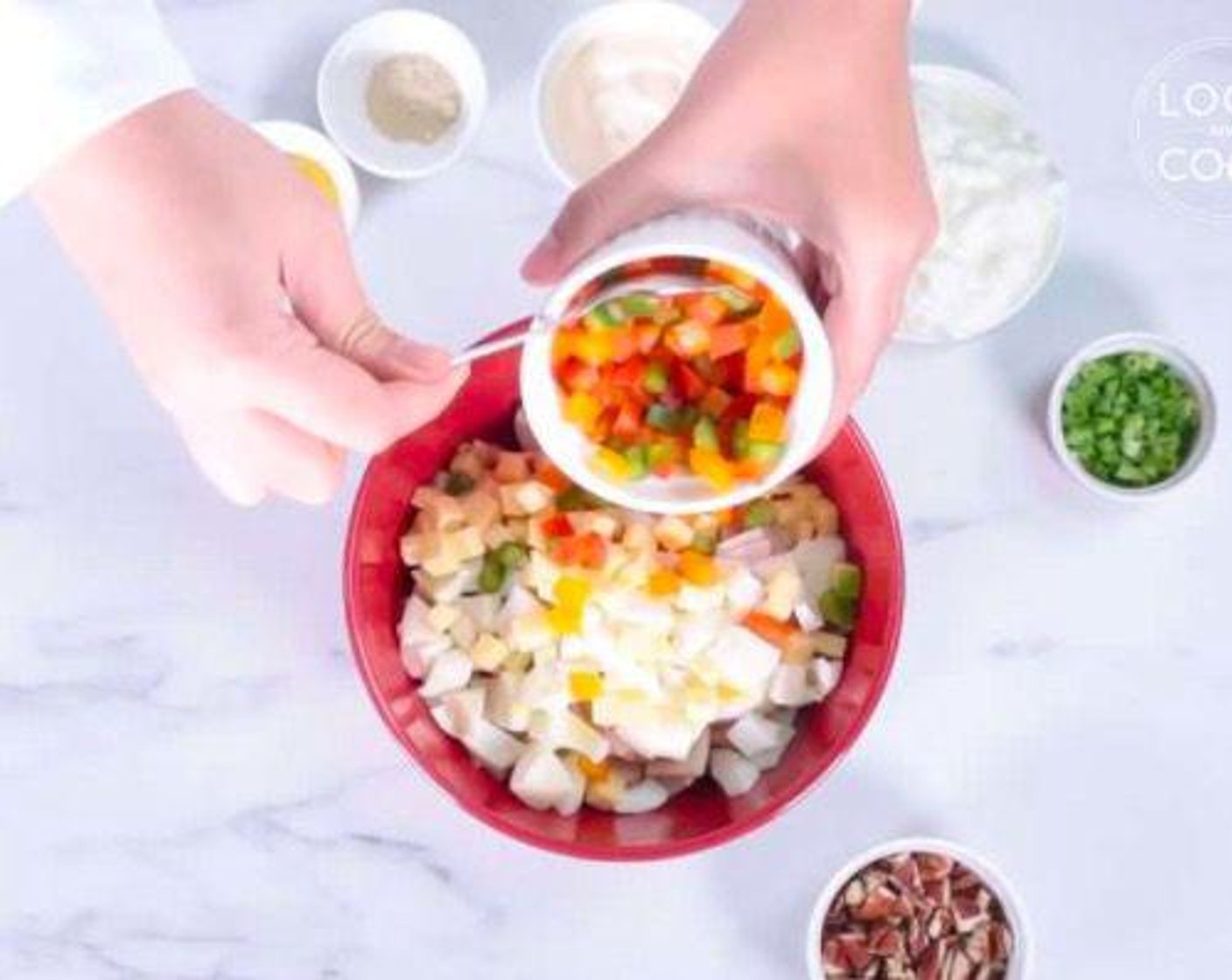 step 4 Add Cheddar Cheese (1 1/4 cups), Mayonnaise (1/2 cup), Red Bell Pepper (1/2 cup), Scallions (4 Tbsp), Simply Organic Garlic Powder (1 tsp), Yellow Mustard (1 Tbsp), Ground Black Pepper (1/2 tsp), Salt (1/4 tsp)
