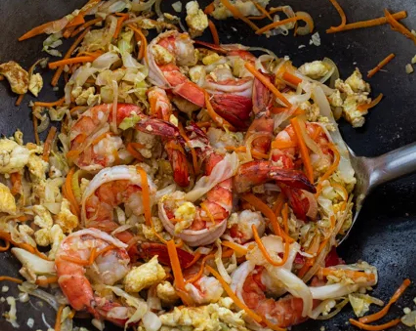 step 8 Add the Large Shrimp (8 oz) to the wok and stir-fry the shrimp for about 1 minute, till fully cooked.